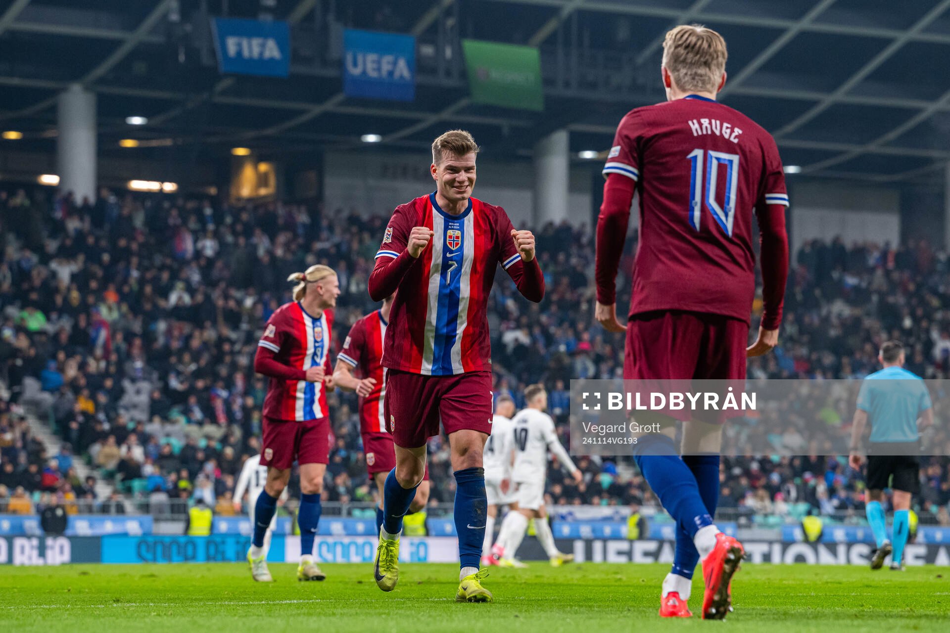 Jens Petter Hauge of Norway celebrates with teammate