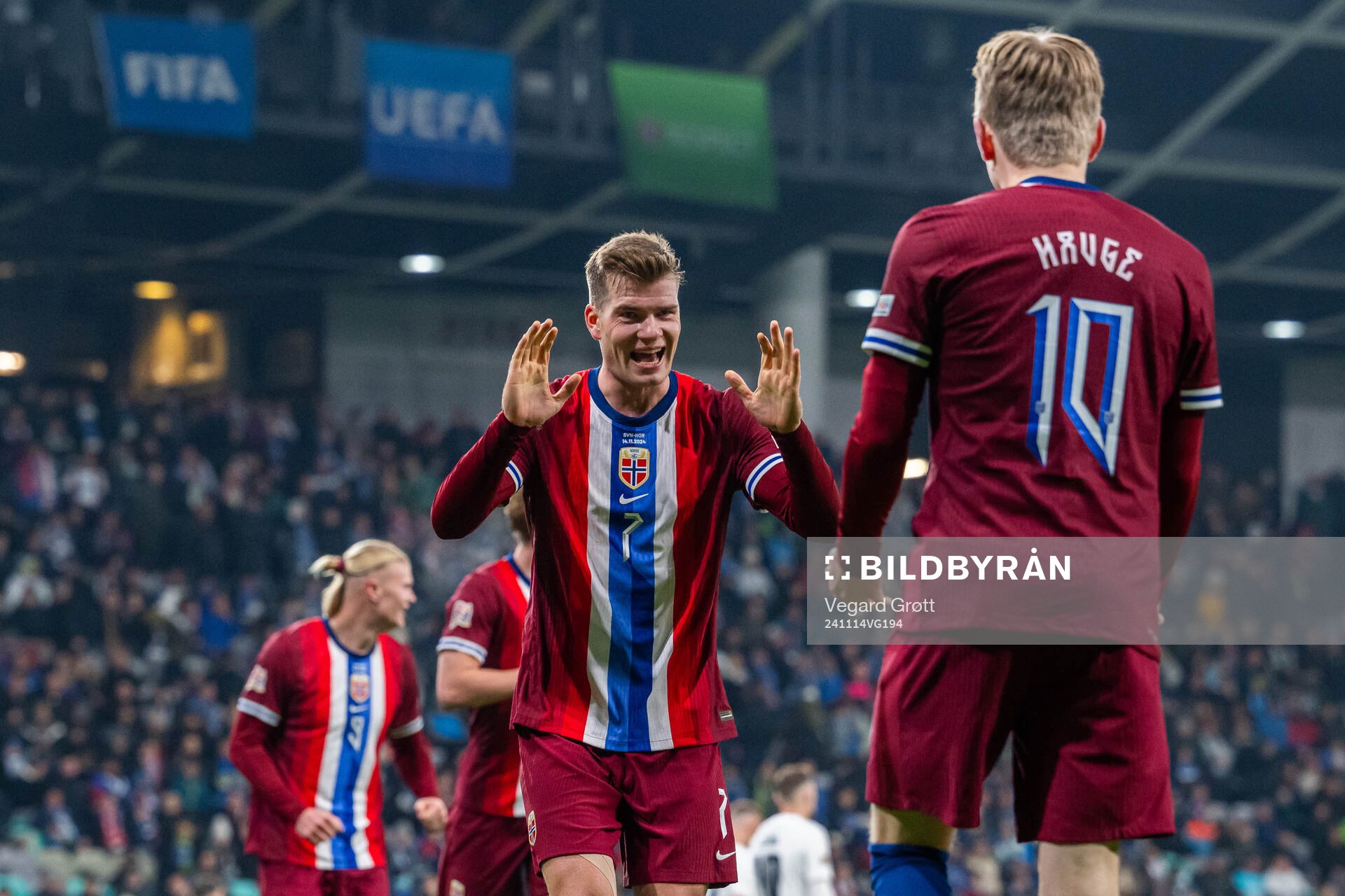 Jens Petter Hauge of Norway celebrates with teammate