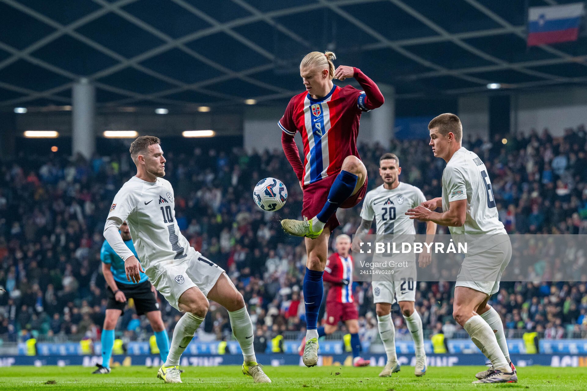 Timi Elsnik of Slovenia, Erling Braut Haaland of Norway and