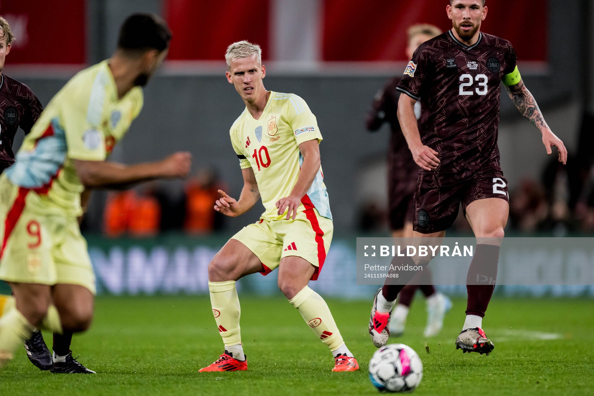 Dani Olmo of Spain and Pierre-Emile Højbjerg of Denmark