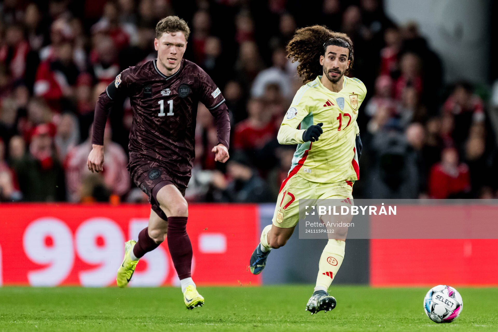 Andreas Skov Olsen of Denmark and Marc Cucurella of Spain