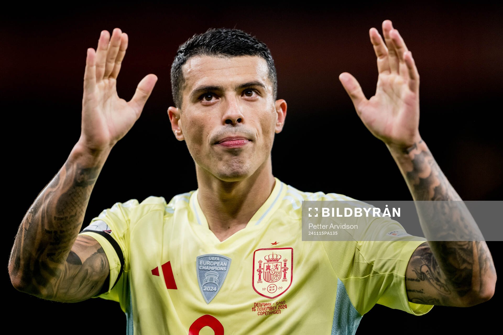 Pedro Porro of Spain celebrates
