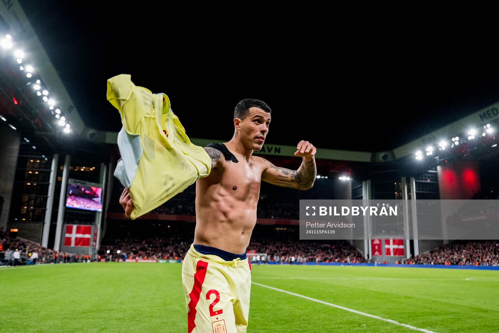 Pedro Porro of Spain celebrates