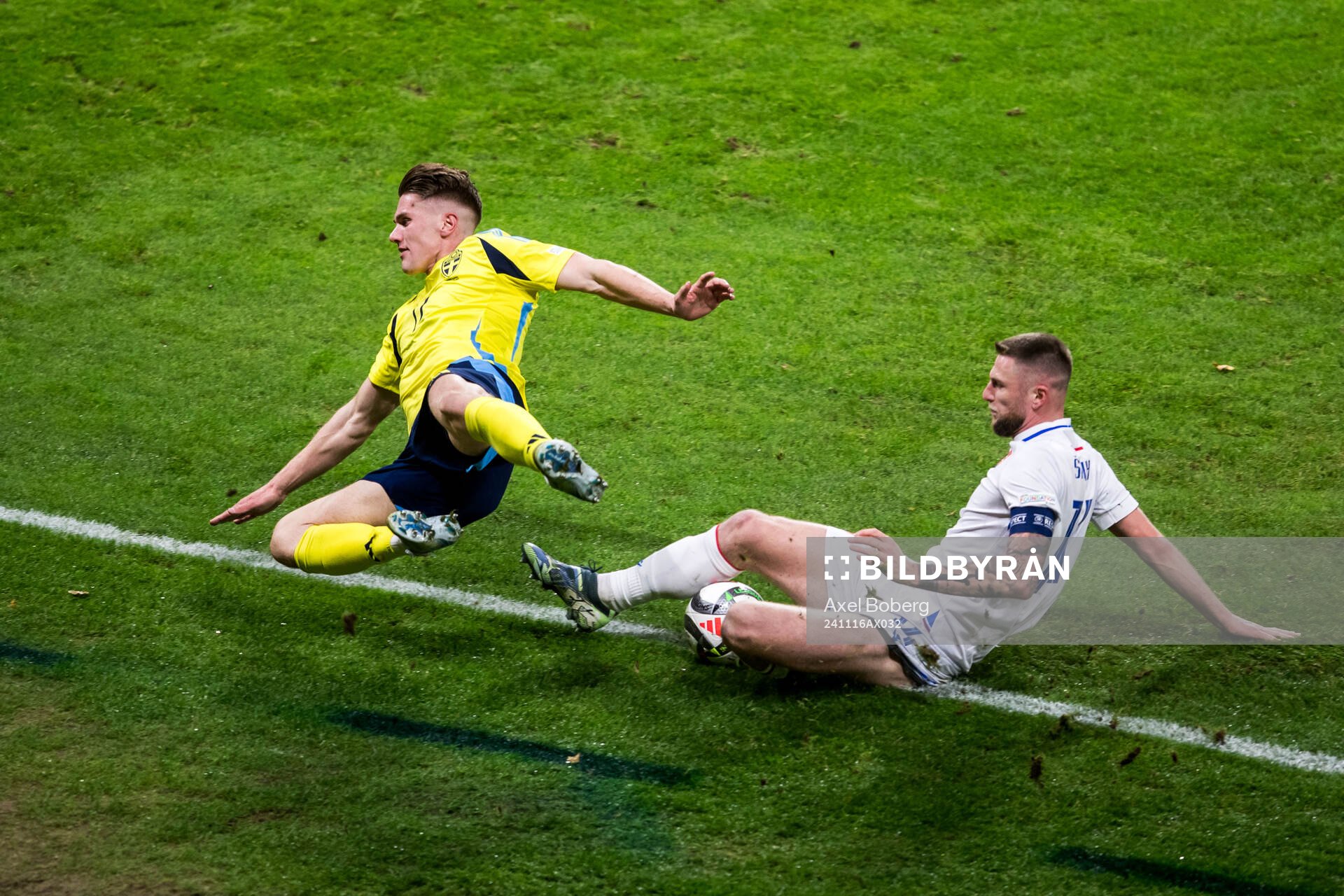 Viktor Gyökeres of Sweden and Milan Skriniar of Slovakia