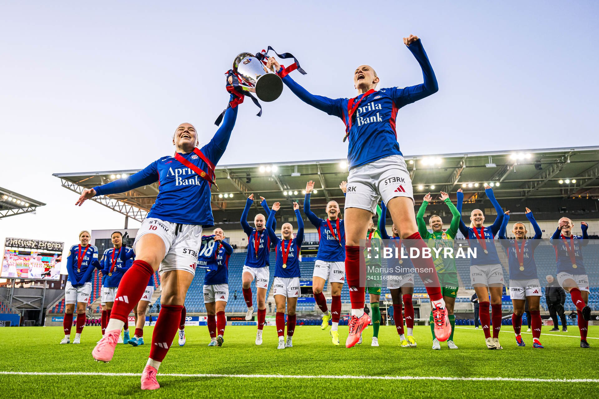 Olaug Tvedten and Karina Sævik of Vålerenga celebrates with the trophy after the Toppserien football match between Vålerenga and LSK Kvinner on November 16, 2024 in Oslo.