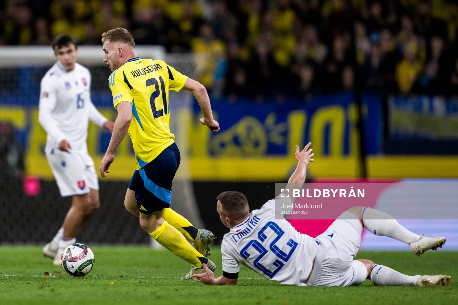Dejan Kulusevski of Sweden and Stanislav Lobotka of Slovakia