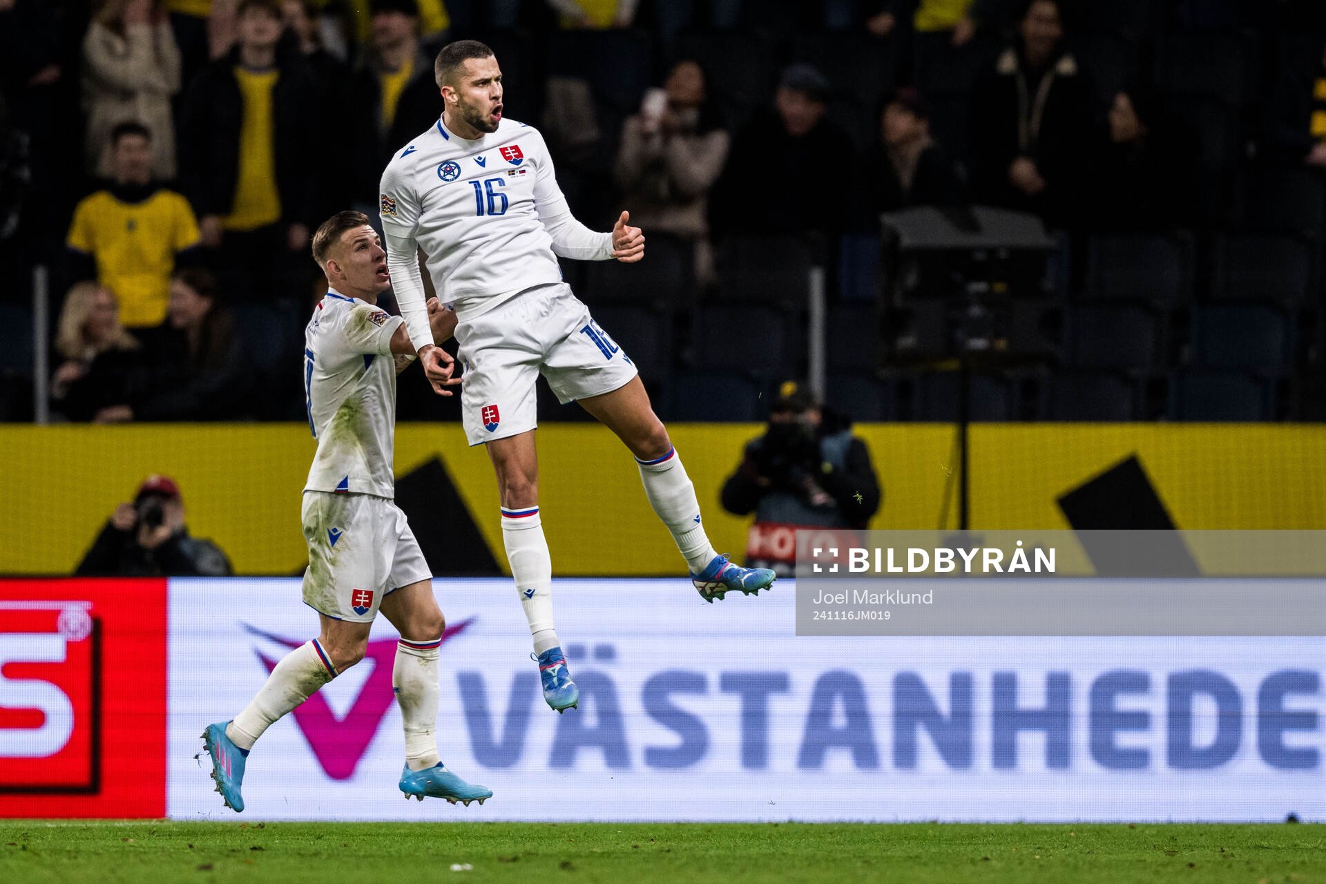 David Hancko of Slovakia celebrates scoring 1-1