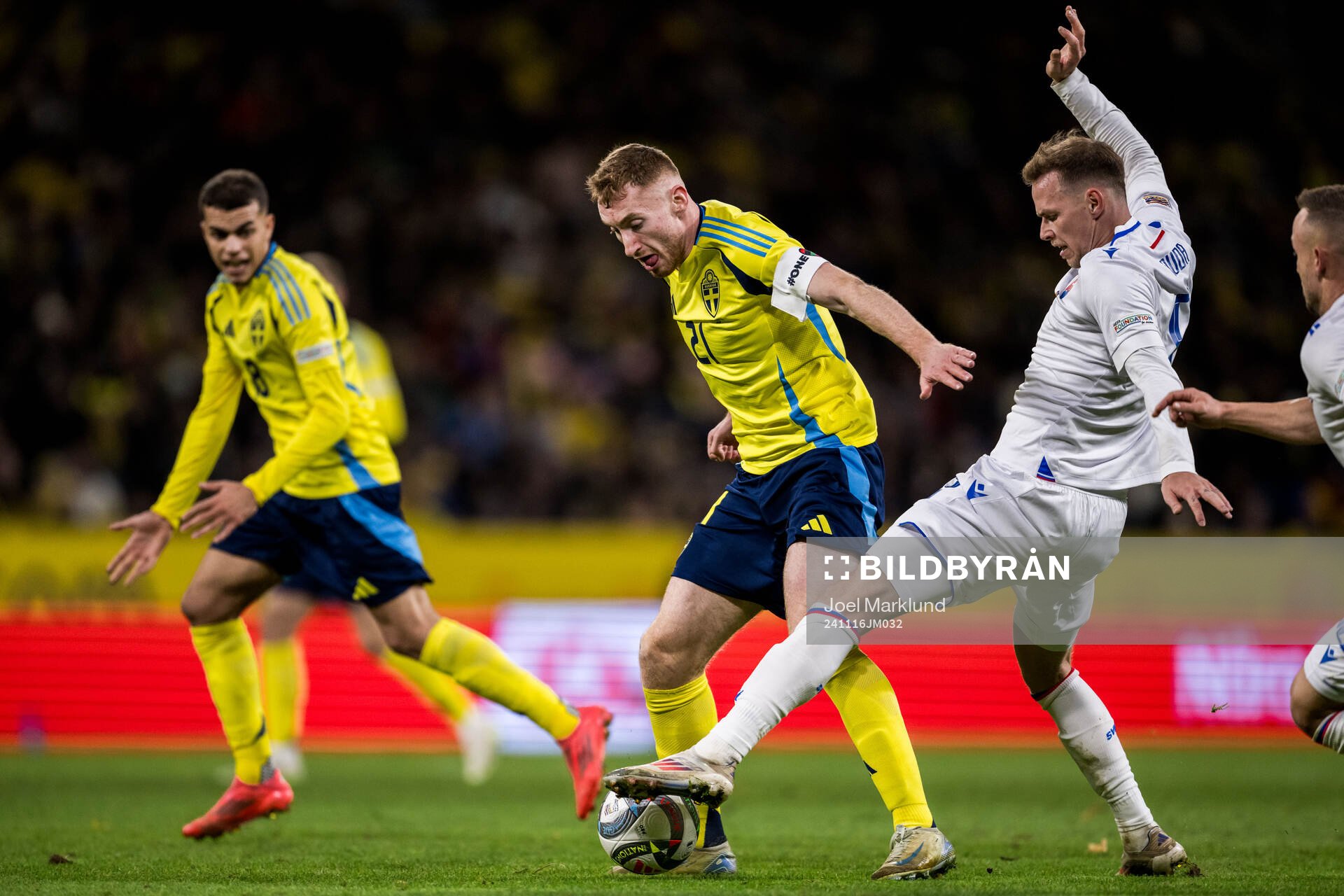Dejan Kulusevski of Sweden and Ondrej Duda of Slovakia