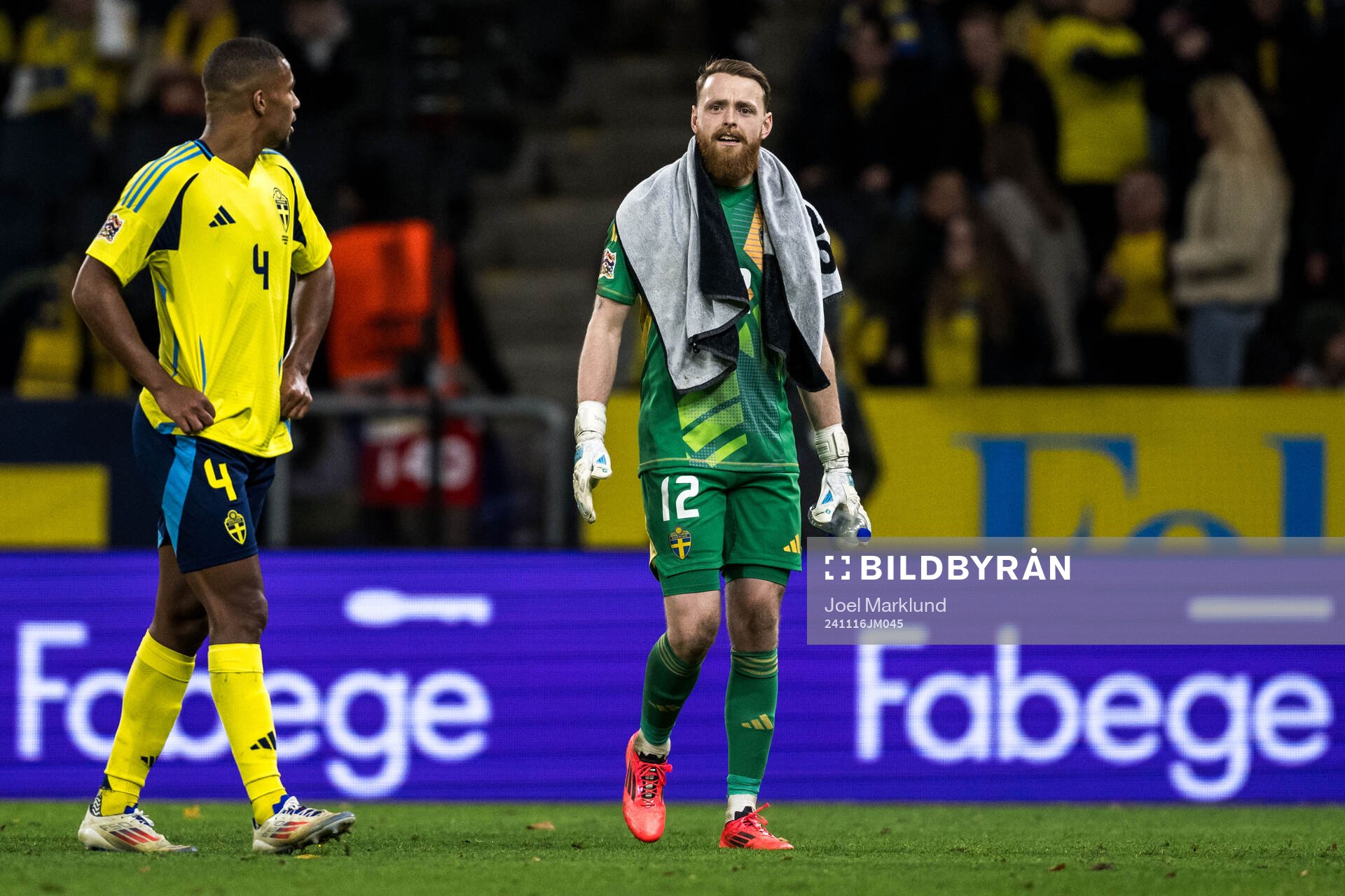 Isak Hien and goalkeeper Viktor Johansson of Sweden looks