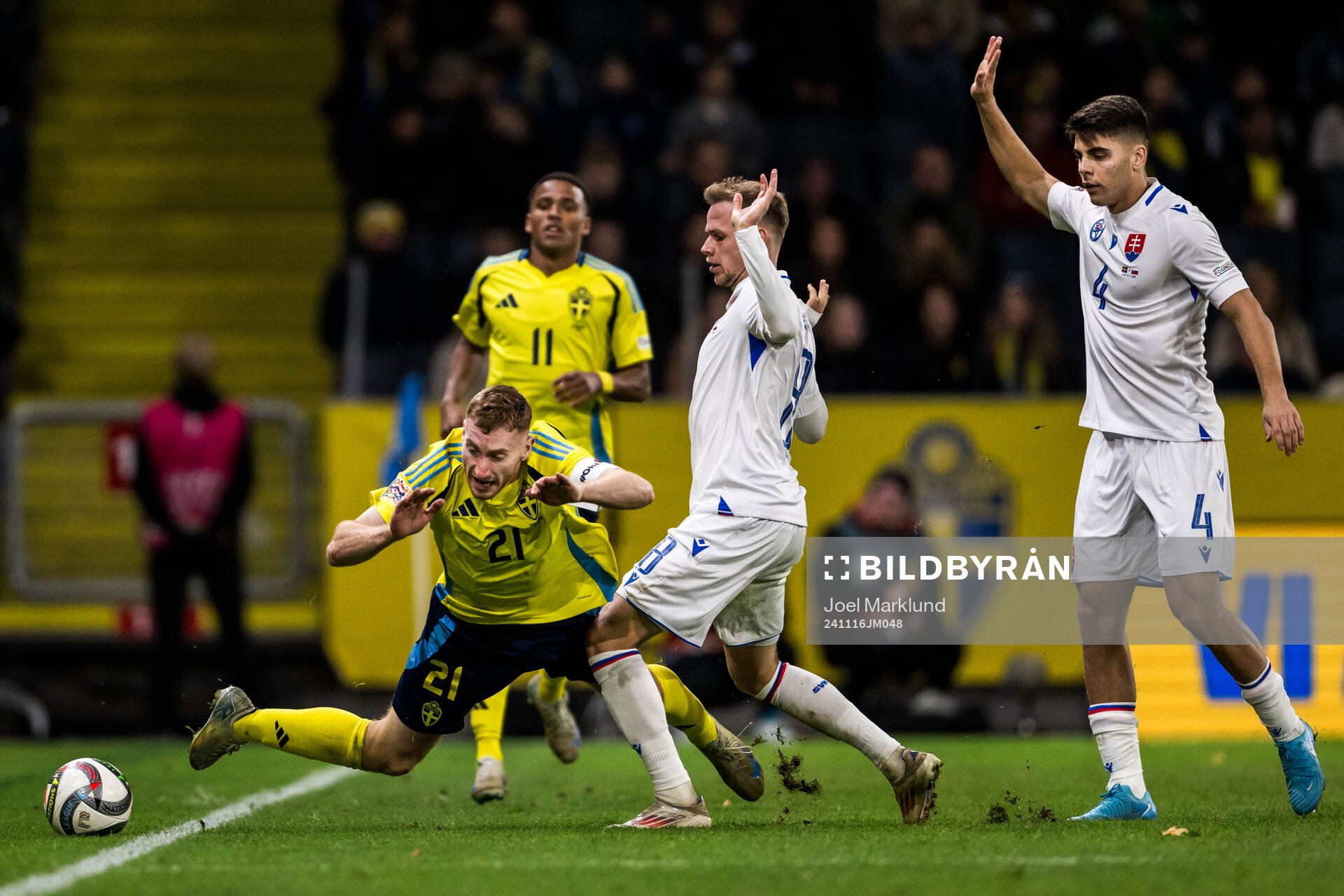 Dejan Kulusevski of Sweden and Ondrej Duda of Slovakia