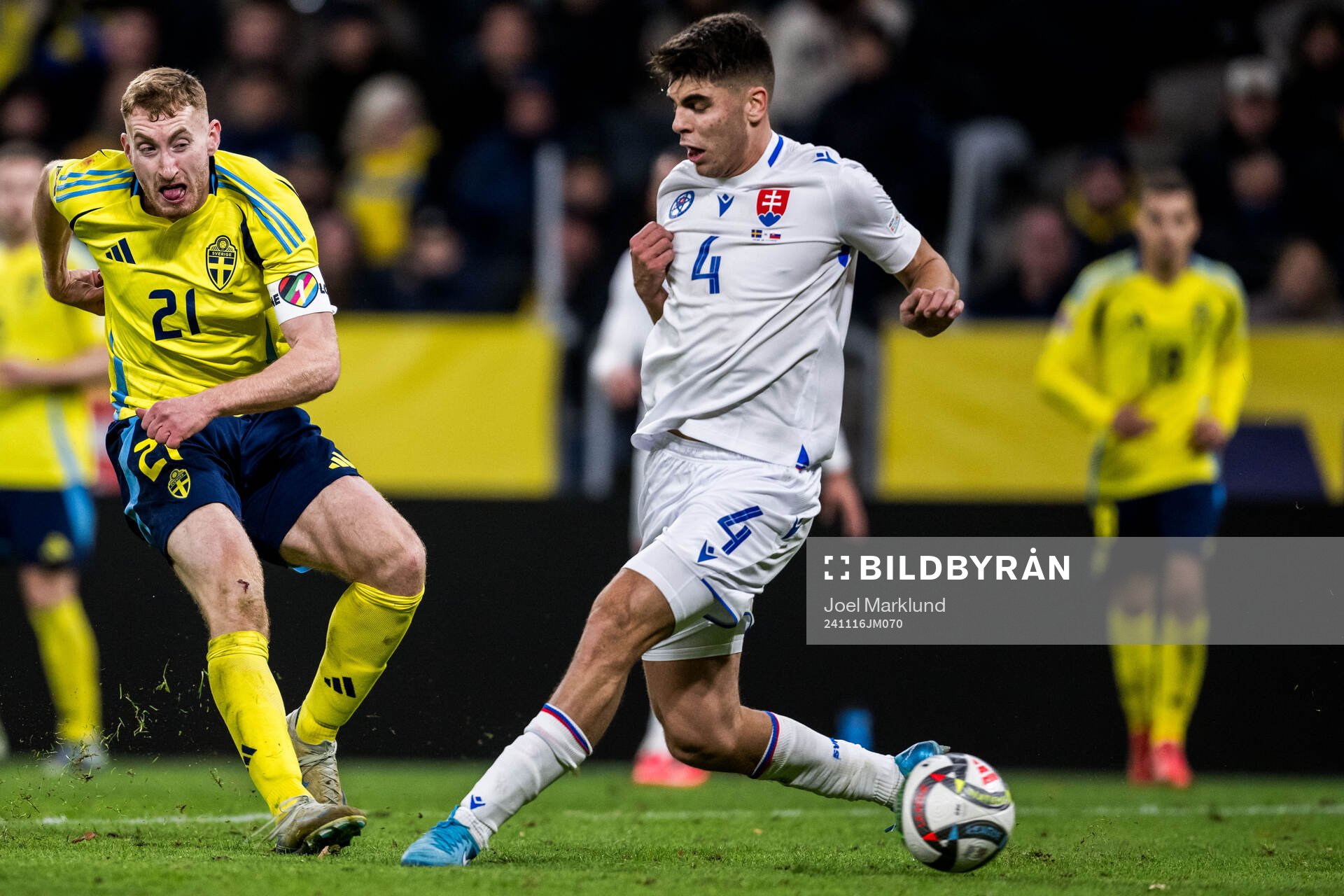 Dejan Kulusevski of Sweden and Adam Obert of Slovakia