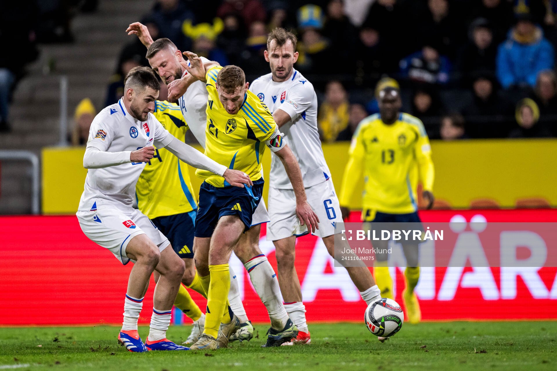 Milan Skriniar and Norbert Gyömber of Slovakia and Dejan