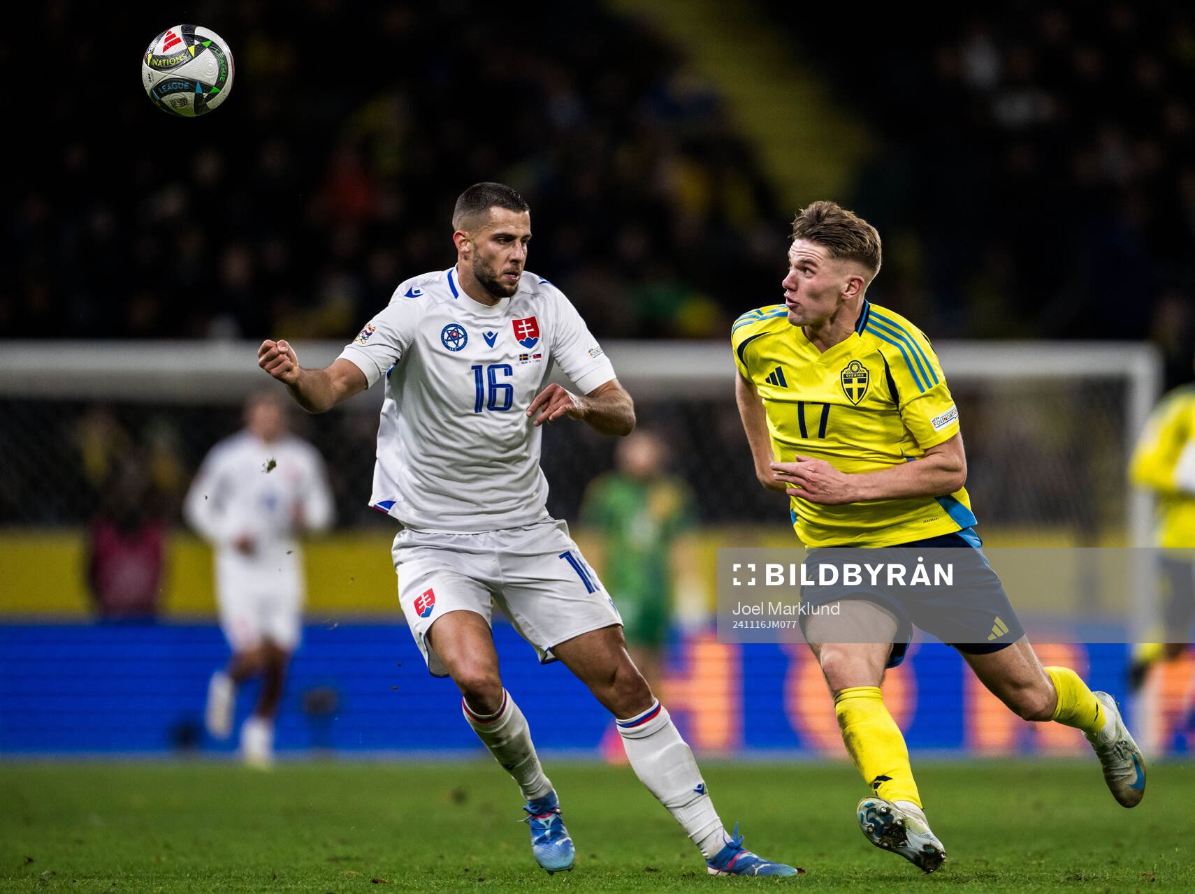 David Hancko of Slovakia and Viktor Gyökeres of Sweden