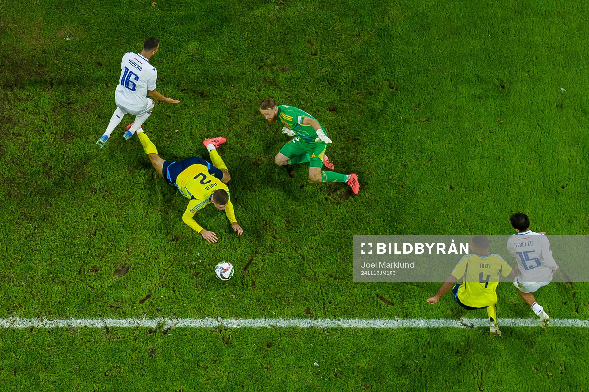 David Hancko and David Strelec of Slovakia in action against Emil Holm, goalkeeper Viktor Johansson and Isak Hien of Sweden during the Nations League football match between Sweden and Slovakia on November 16, 2024 in Stockholm.