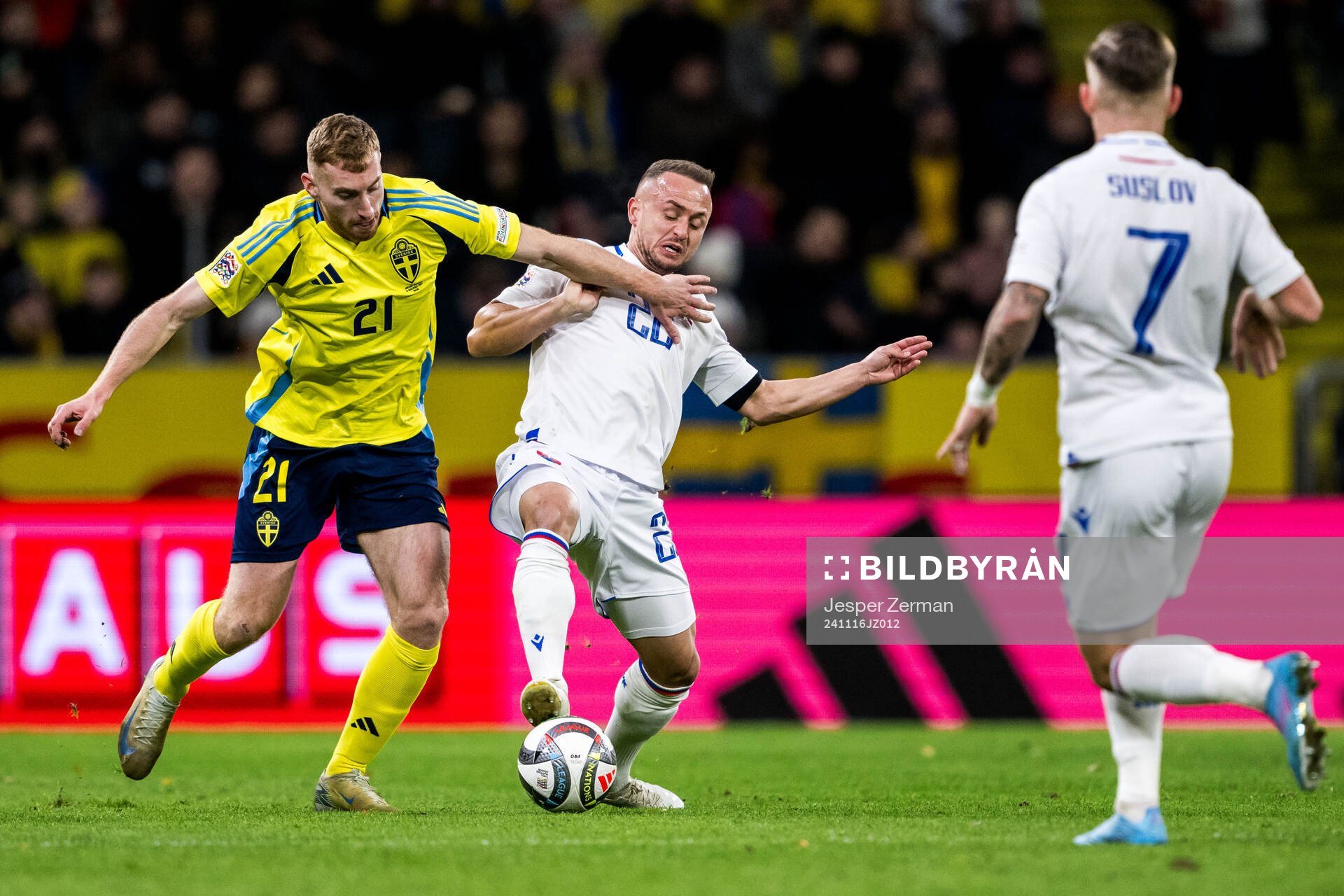 Dejan Kulusevski of Sweden and Stanislav Lobotka of Slovakia