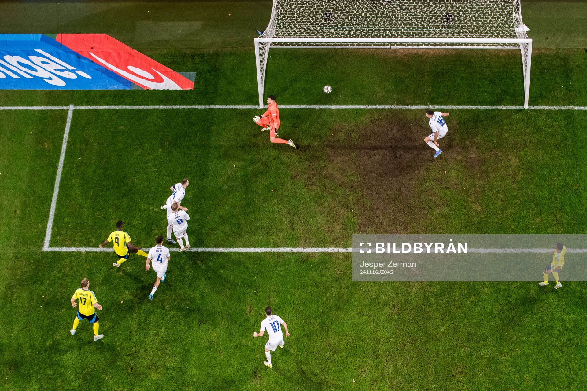 Alexander Isak of Sweden scores 2-1 behind goalkeeper