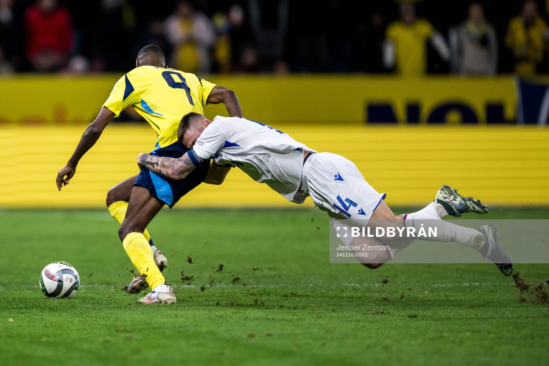 Milan Skriniar of Slovakia and Alexander Isak of Sweden