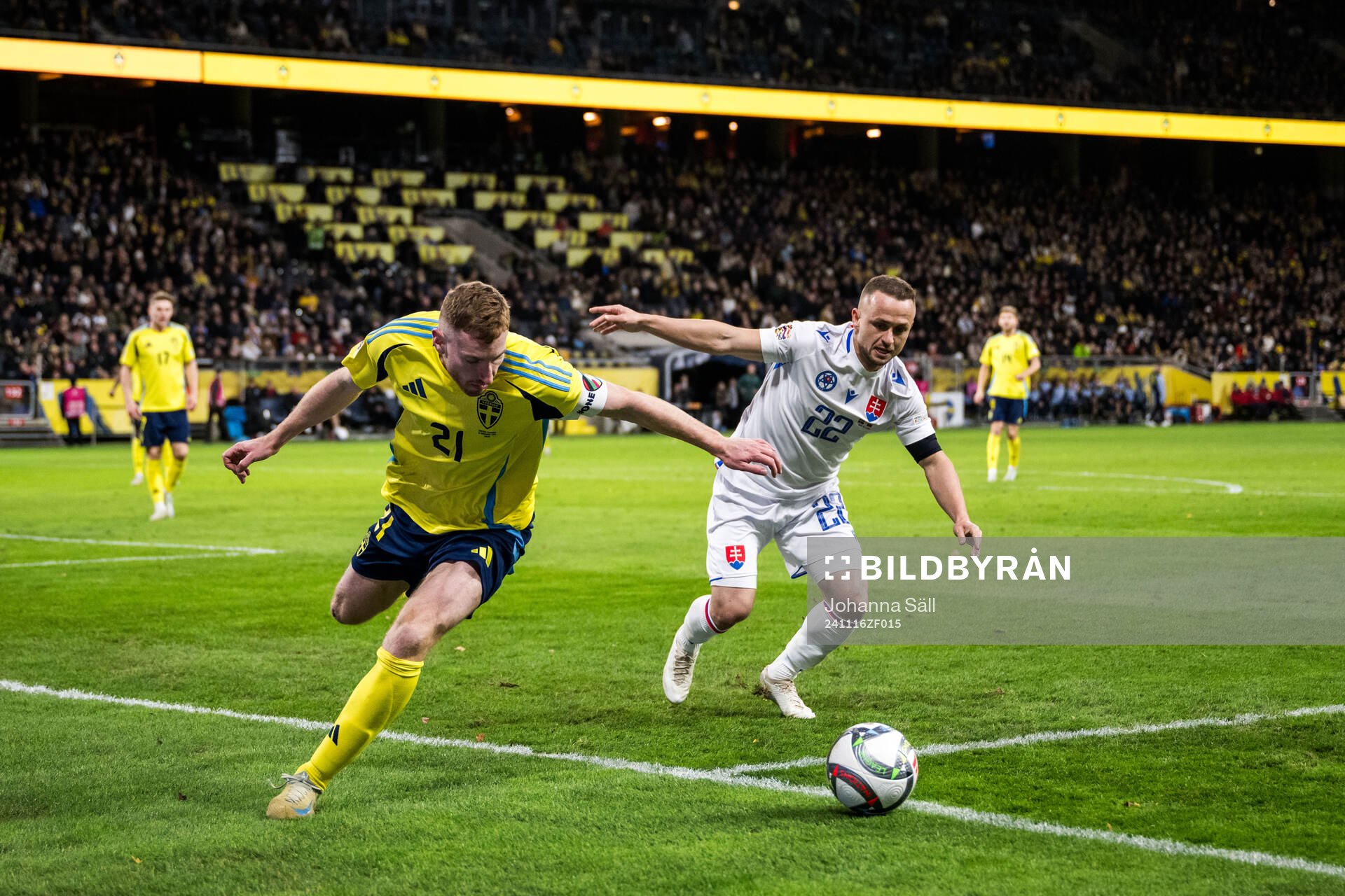 Dejan Kulusevski of Sweden and Stanislav Lobotka of Slovakia