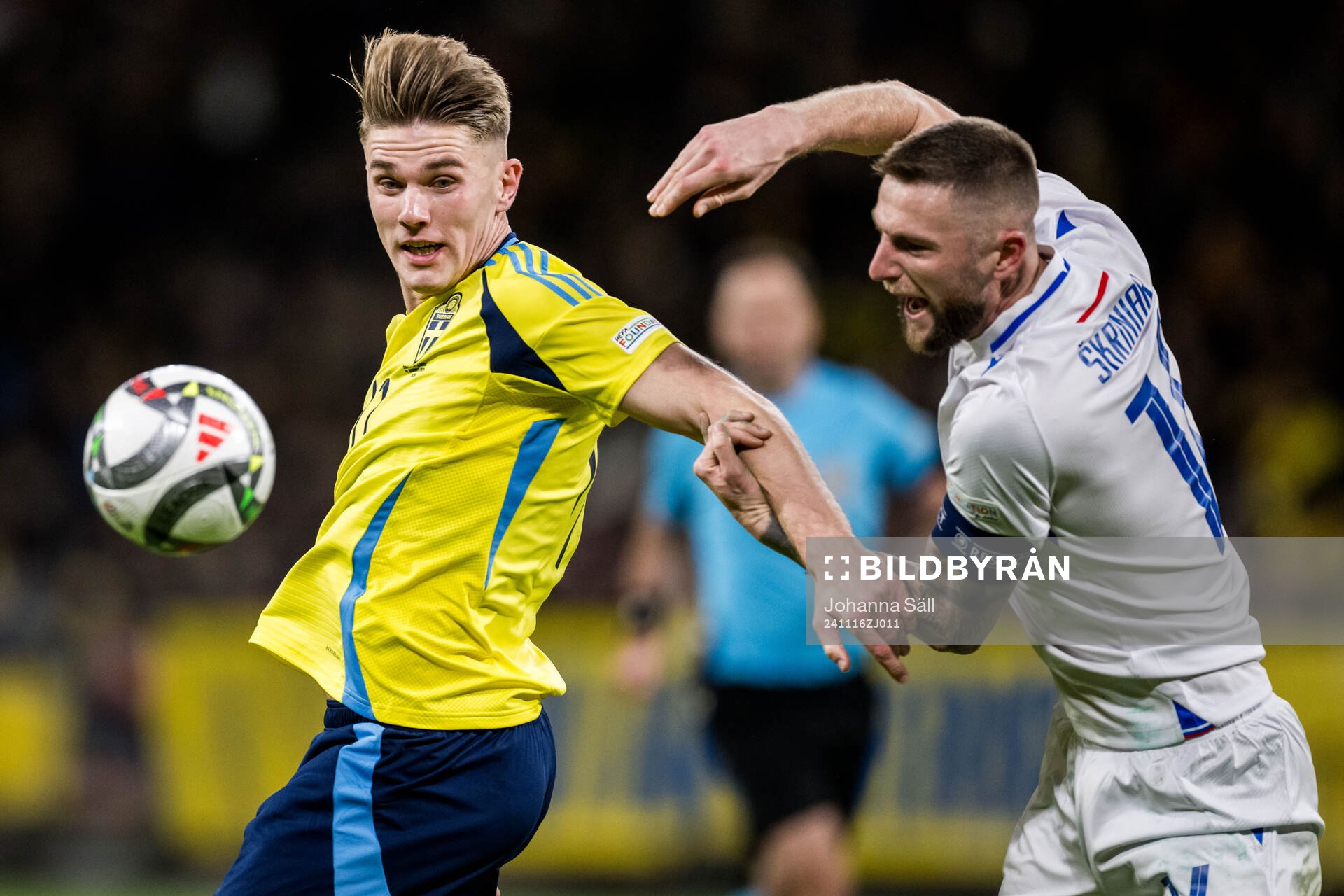 Viktor Gyökeres of Sweden and Milan Skriniar of Slovakia