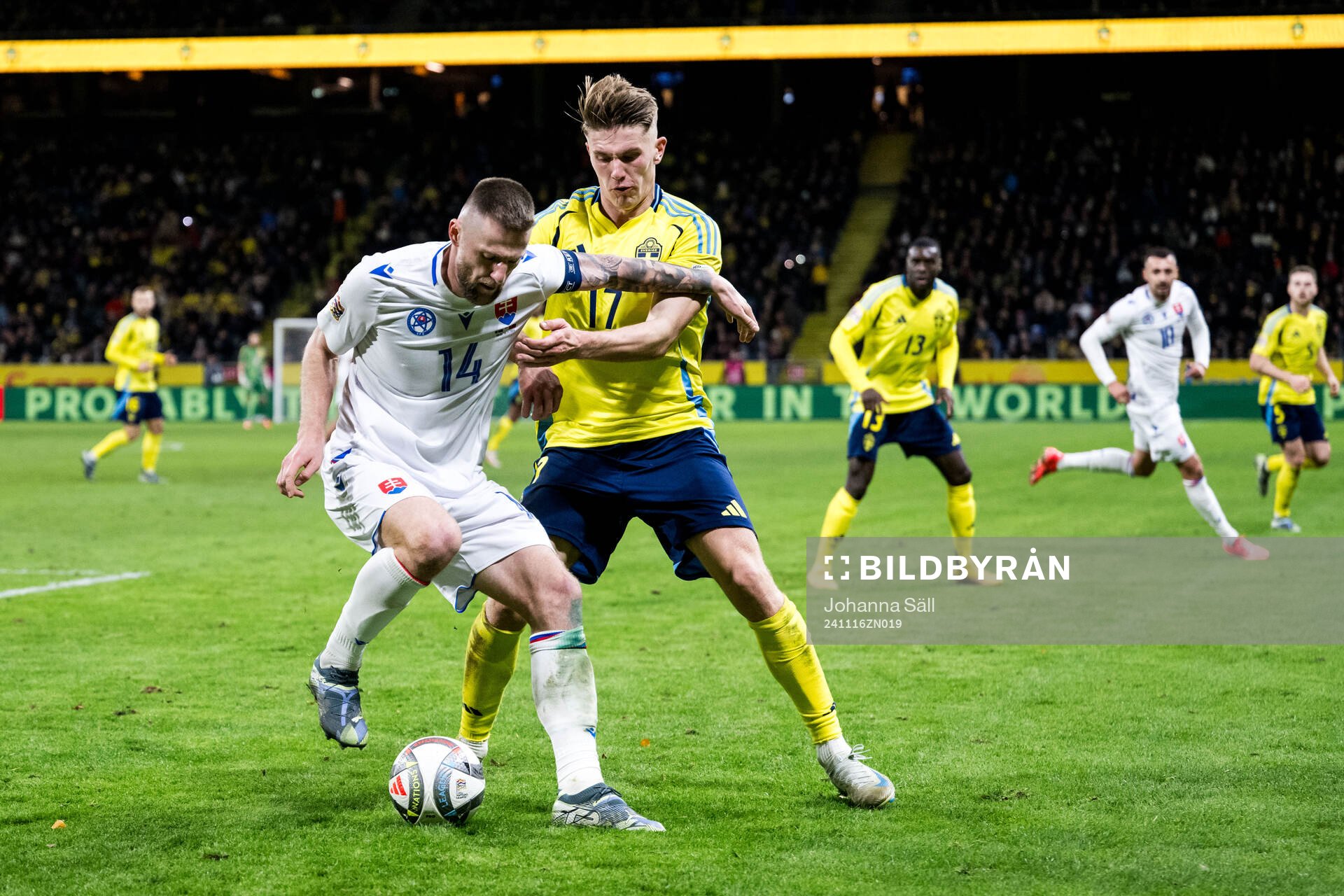 Milan Skriniar of Slovakia and Viktor Gyökeres of Sweden