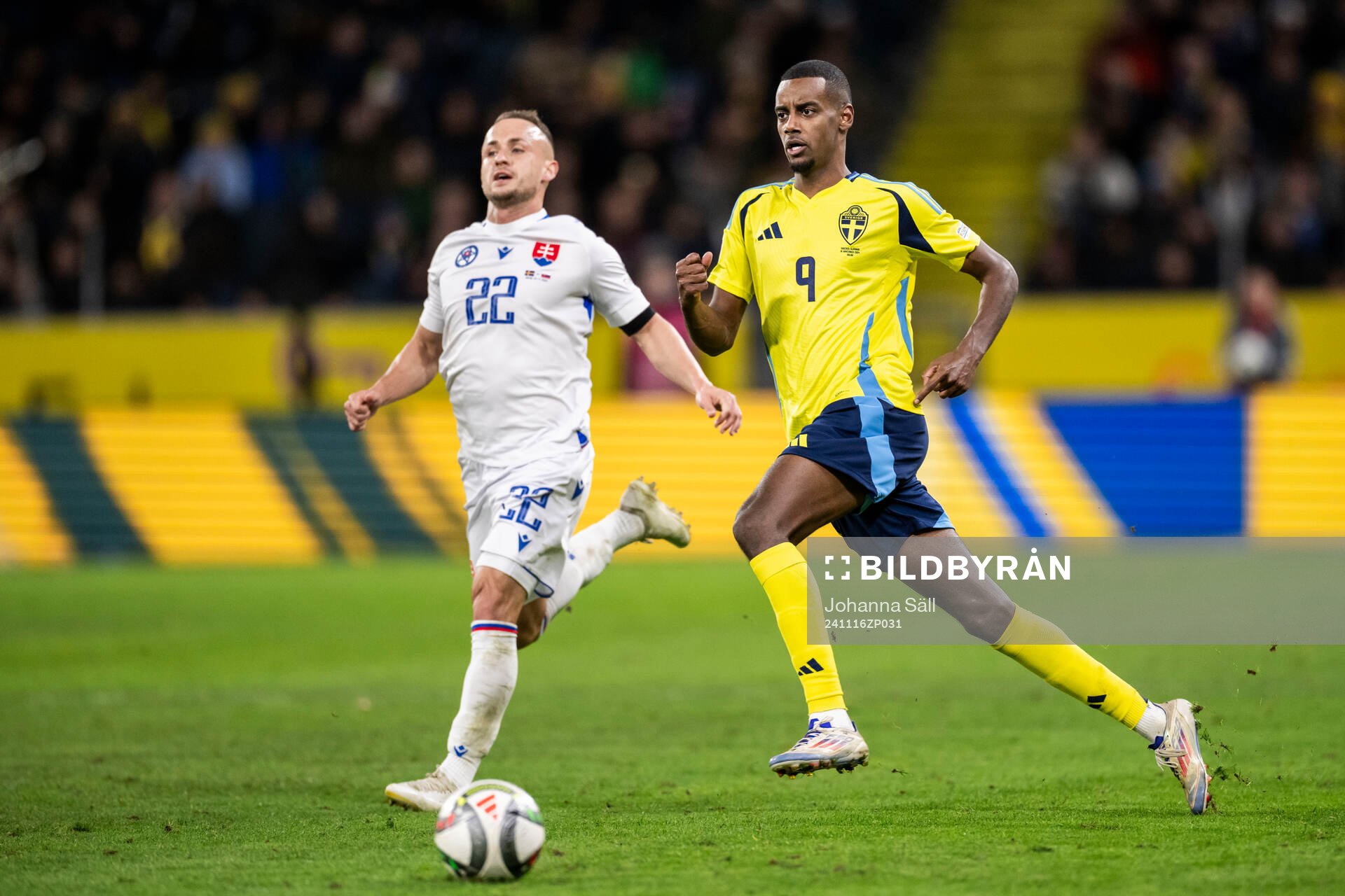 Stanislav Lobotka of Slovakia and Alexander Isak of Sweden