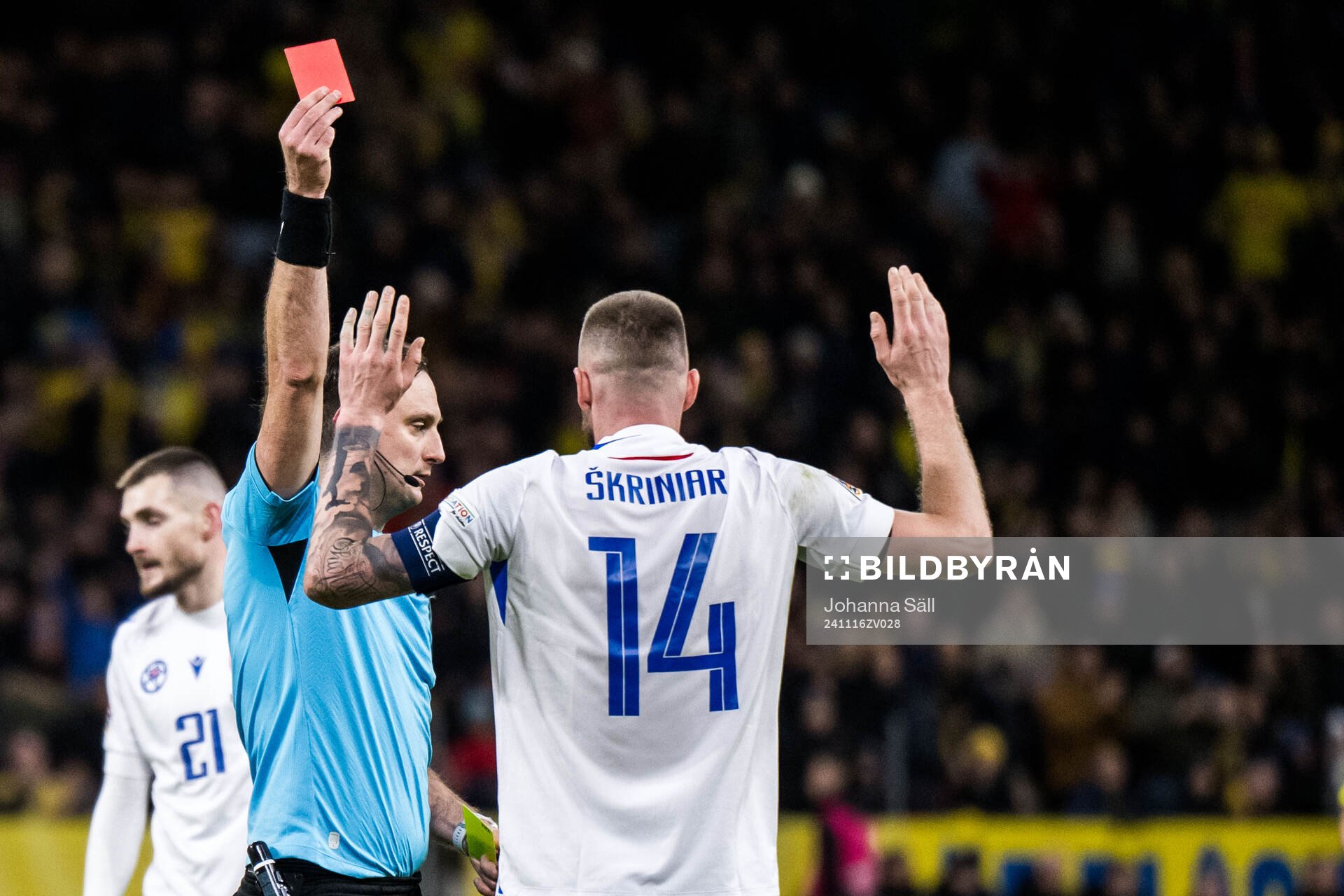Milan Skriniar of Slovakia receives a red card