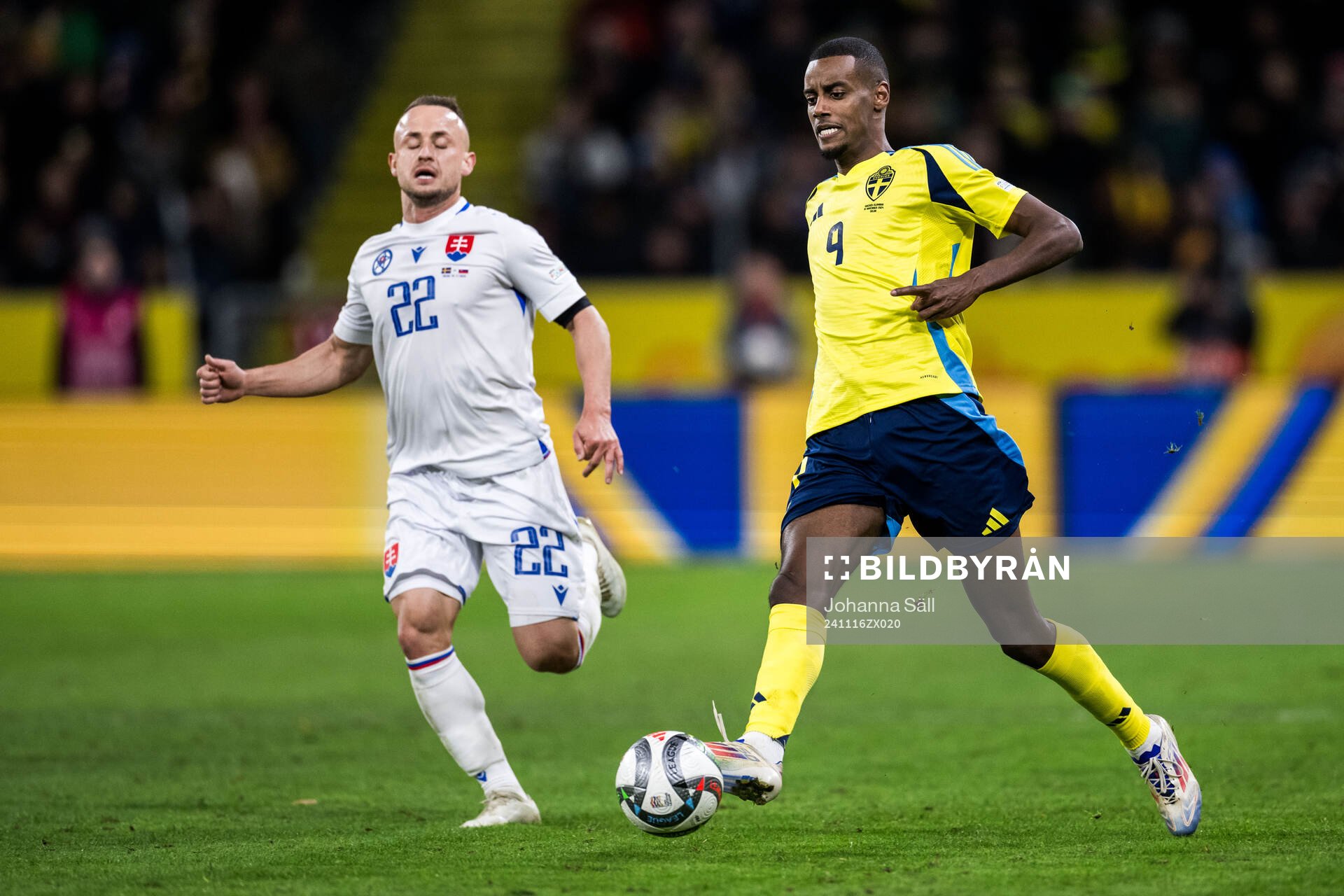 Stanislav Lobotka of Slovakia and Alexander Isak of Sweden