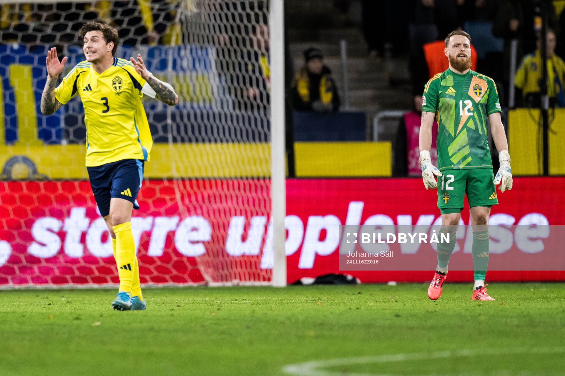 Victor Nilsson Lindelöf and goalkeeper Viktor Johansson of