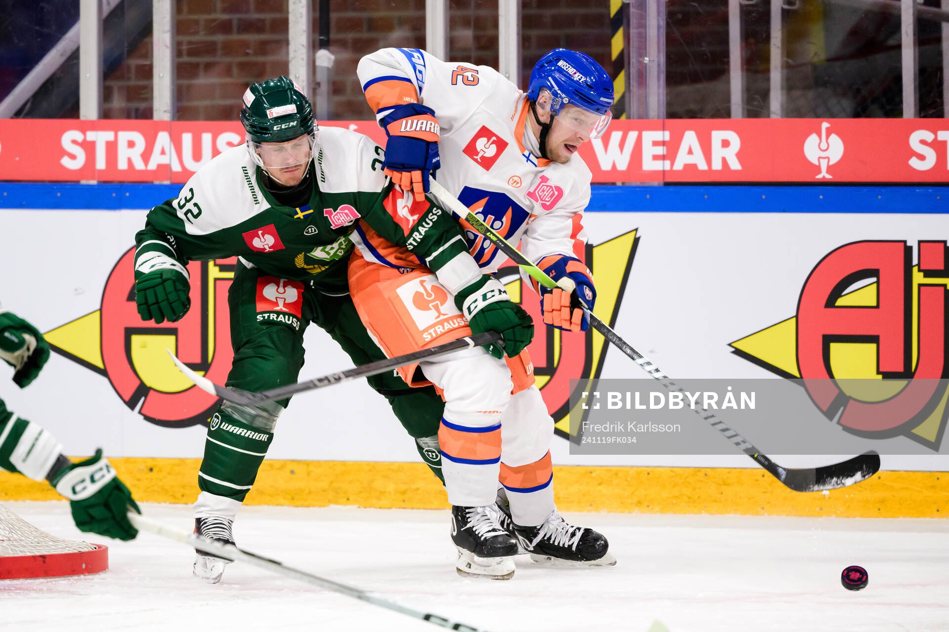 Magnus Nygren of Färjestad  and Otto Rauhala of Tappara