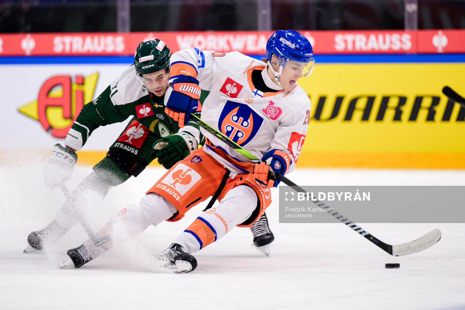 Viktor Lodin of Färjestad  and Oiva Keskinen of Tappara