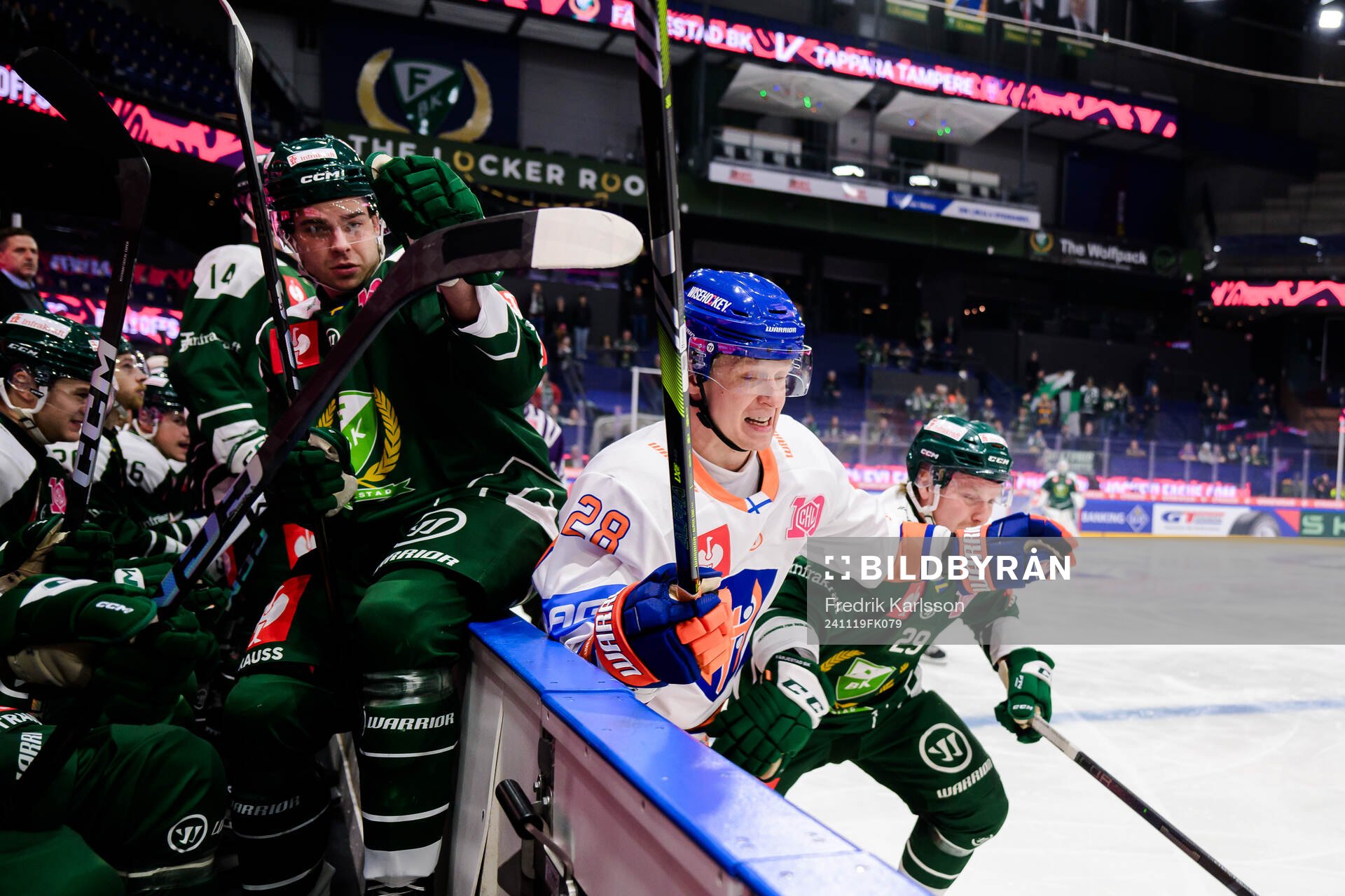 Viktor Lodin of Färjestad  and Otto Leskinen of Tappara