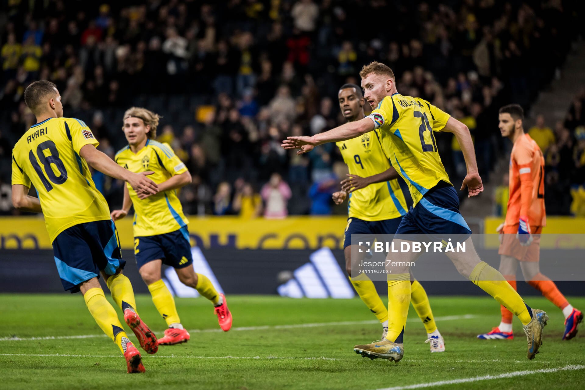 Dejan Kulusevski of Sweden celebrates with Yasin Ayari