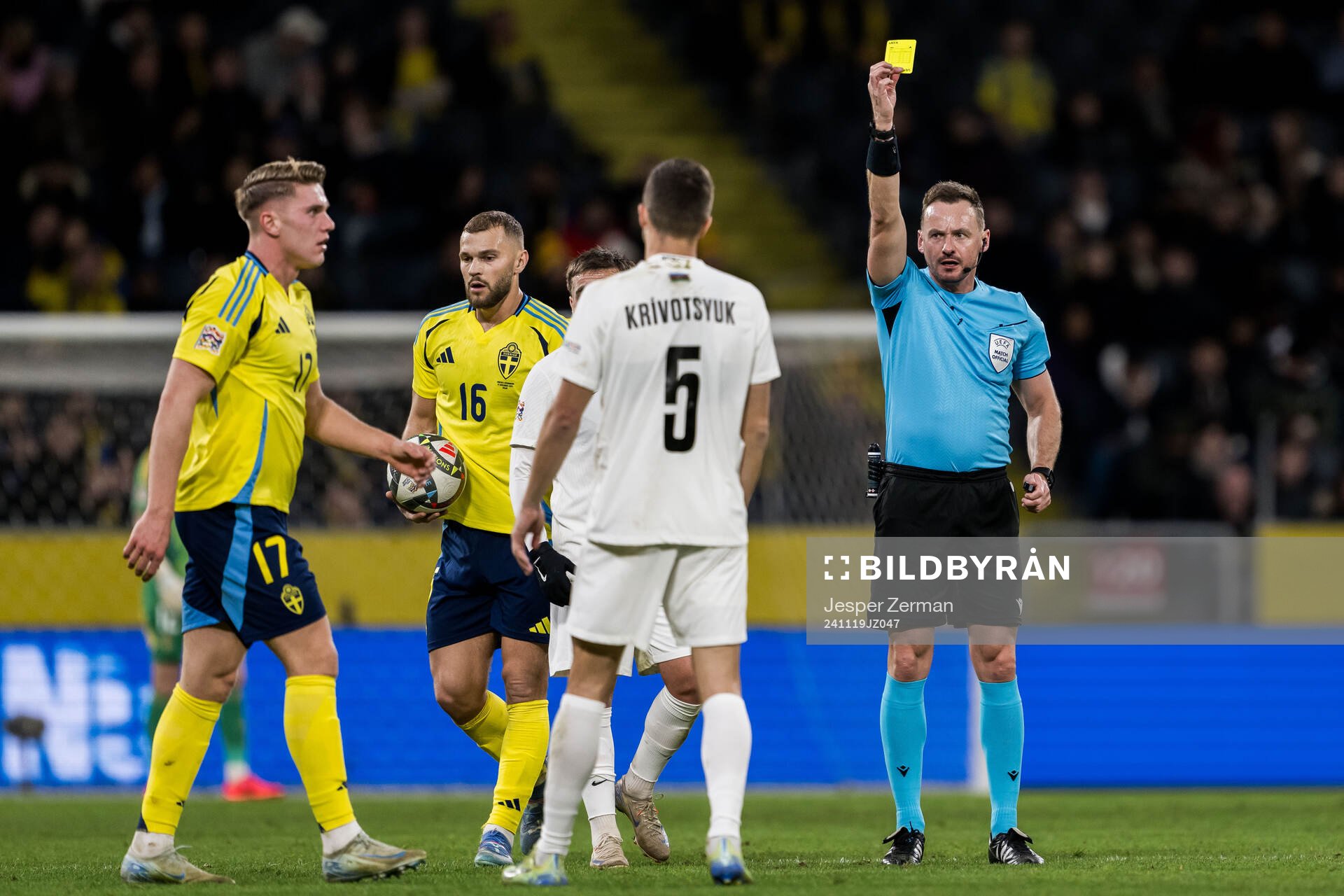 Joshgun Diniyev of Azerbaijan receives a yellow card from