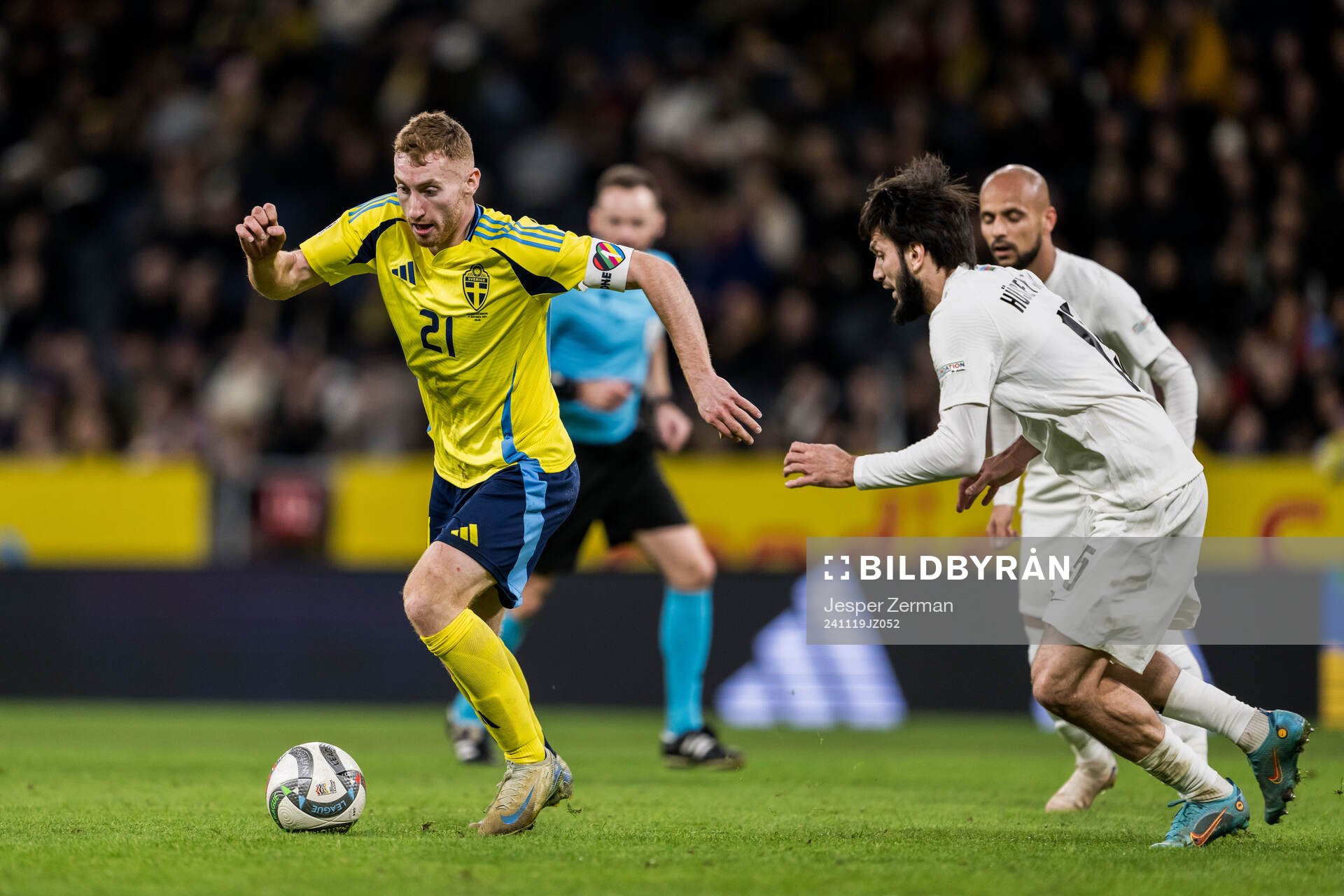 Dejan Kulusevski of Sweden and Joshgun Diniyev of Azerbaijan
