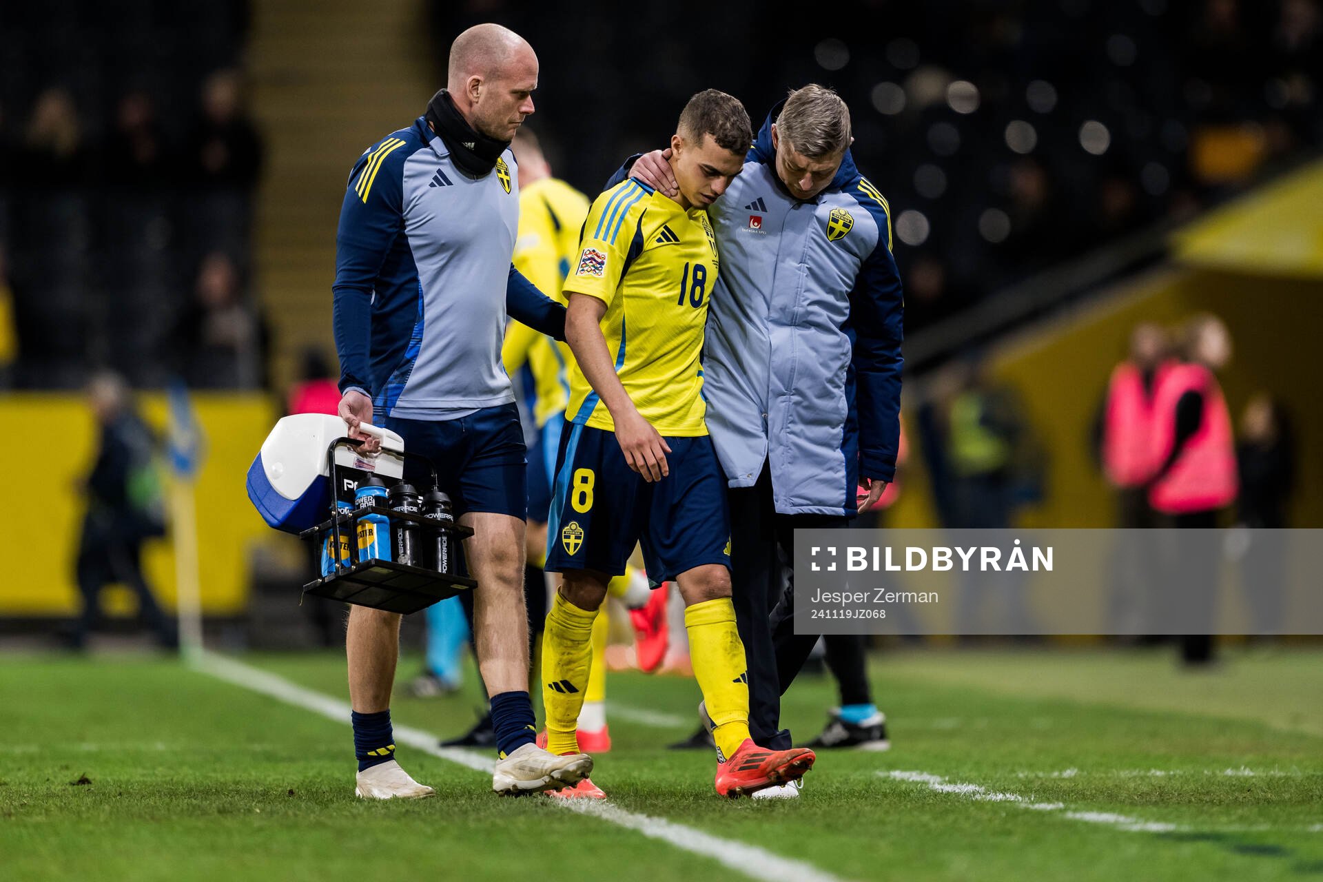 Yasin Ayari of Sweden leaves the pitch injured