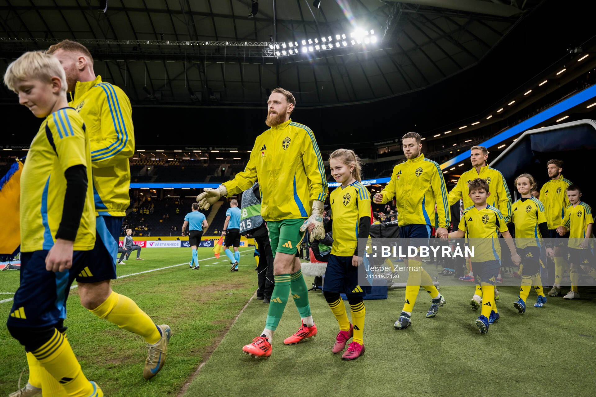 goalkeeper Viktor Johansson, Gabriel Gudmundsson and Carl Starfelt of Sweden with mascots ahead of the Nations League football match between Sweden and Azerbaijan on November 19, 2024 in Stockholm.