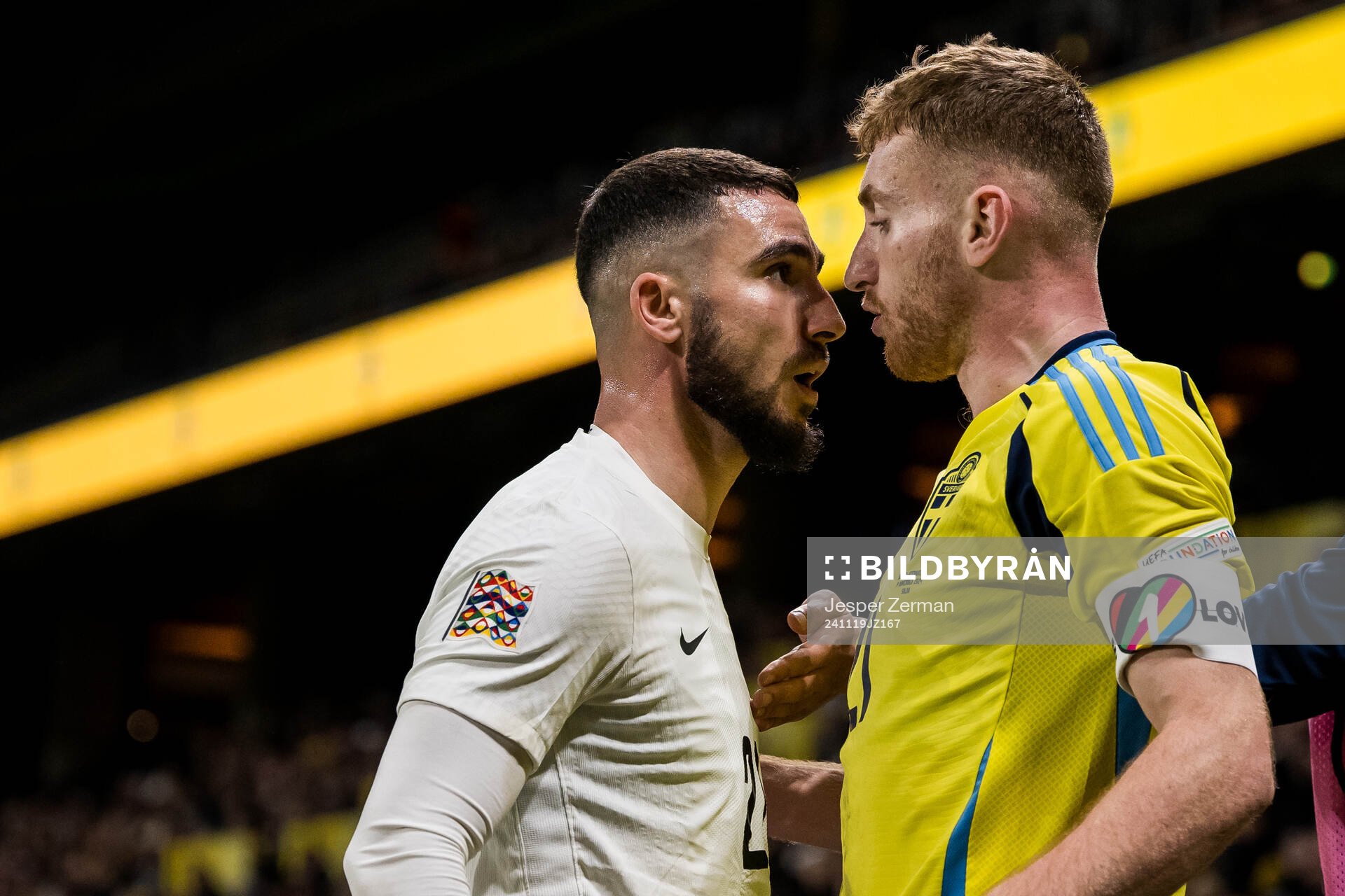 Elvin Jamalov of Azerbaijan and Dejan Kulusevski of Sweden