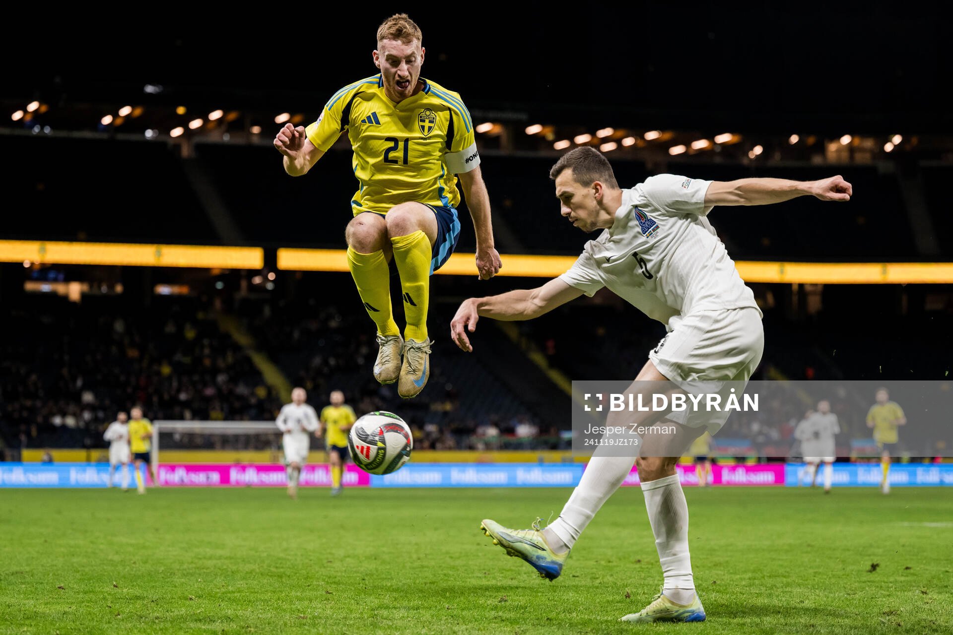 Dejan Kulusevski of Sweden and Joshgun Diniyev of Azerbaijan