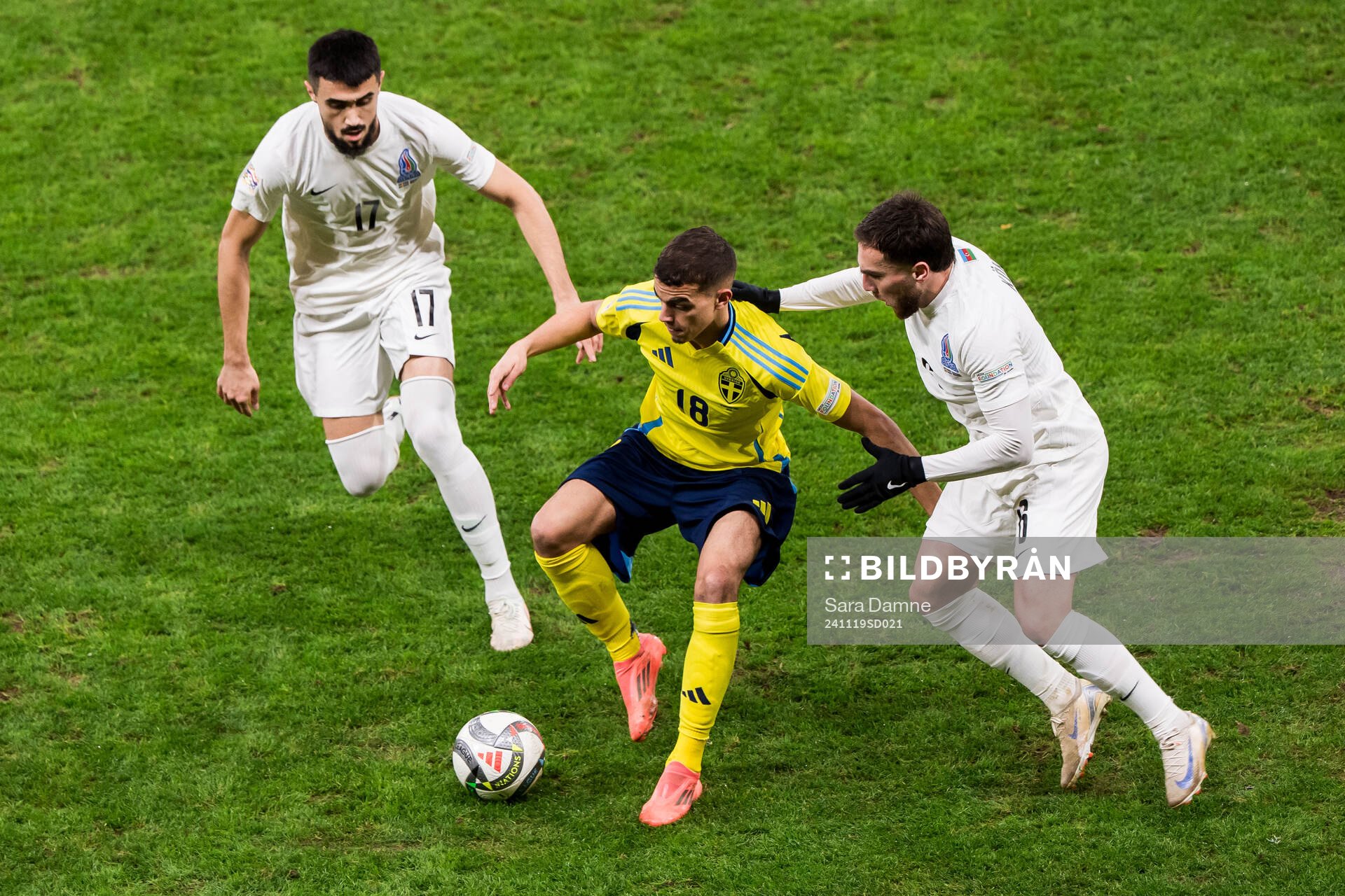 Turan Manafov and Emin Makhmudov of Azerbaijan against Yasin Ayari of Sweden during the Nations League football match between Sweden and Azerbaijan on November 19, 2024 in Stockholm.