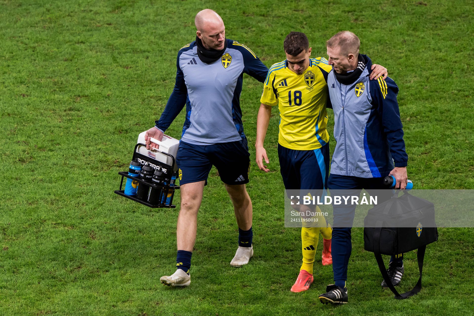 Yasin Ayari of Sweden leaves the pitch injured