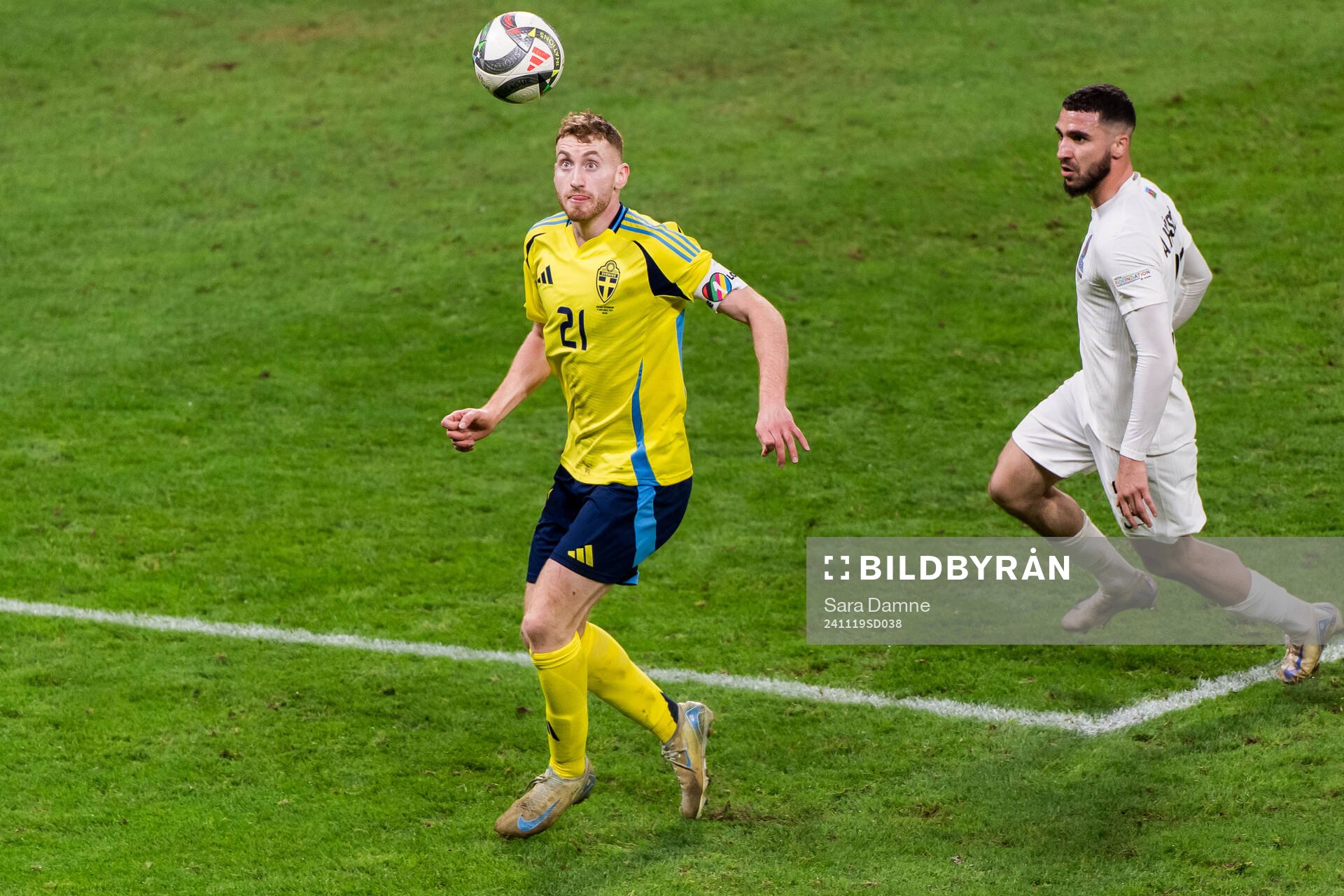 Dejan Kulusevski of Sweden and Elvin Jamalov of Azerbaijan