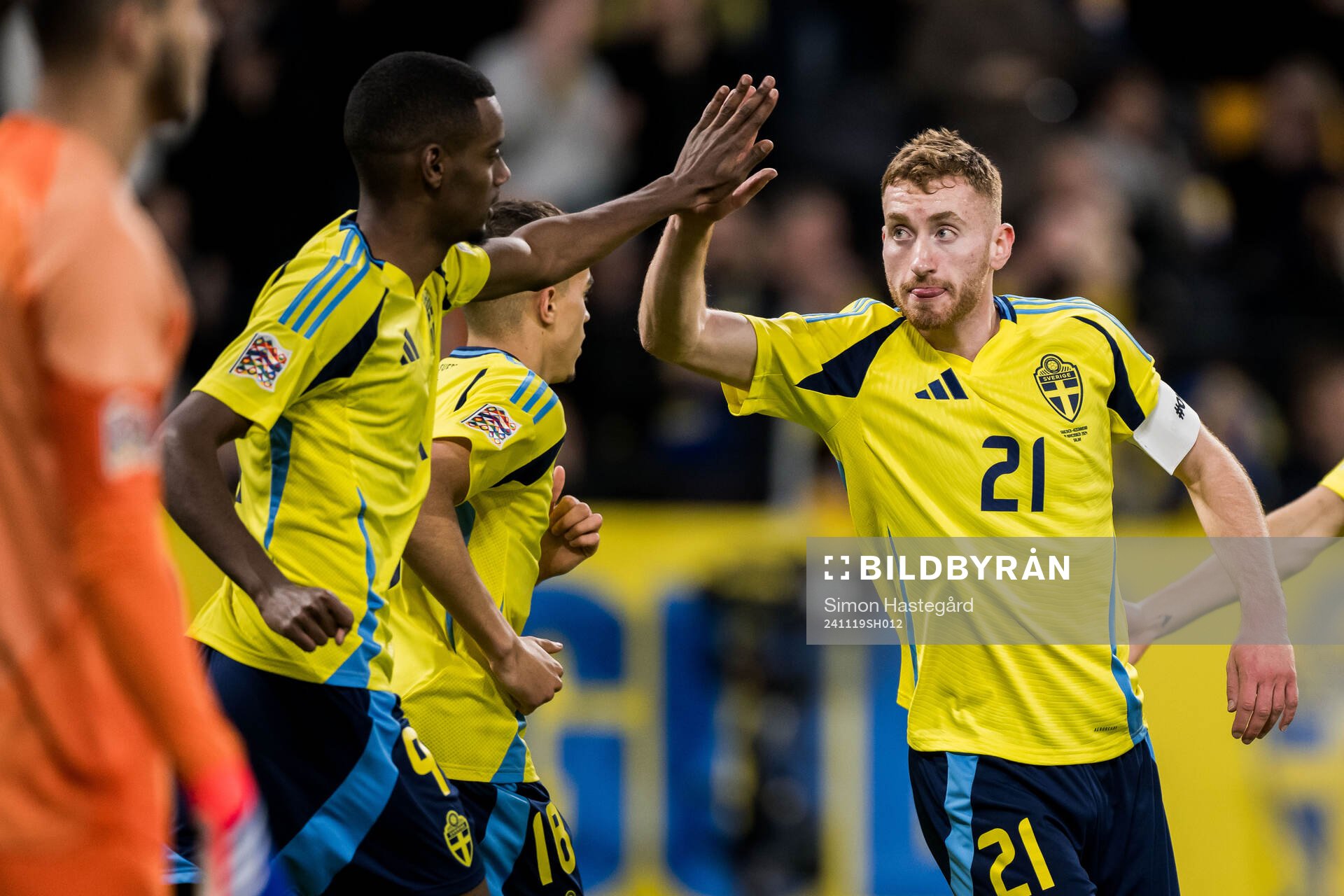 Dejan Kulusevski of Sweden celebrates with Alexander Isak