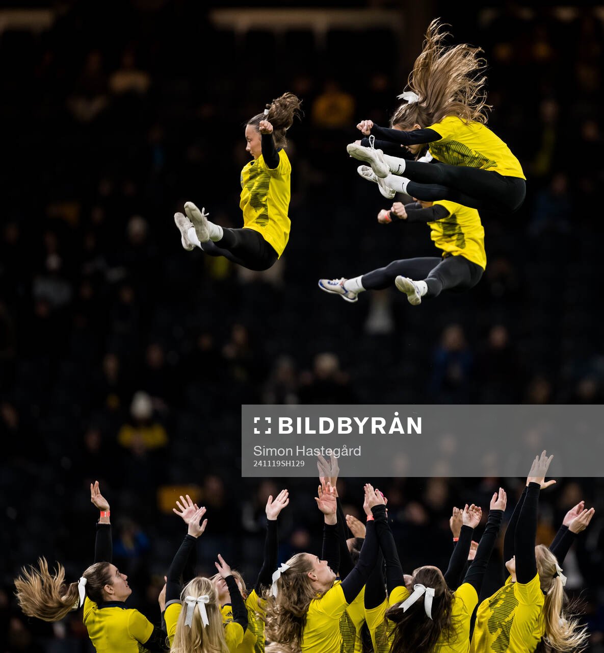 Cheerleaders perform in half-time