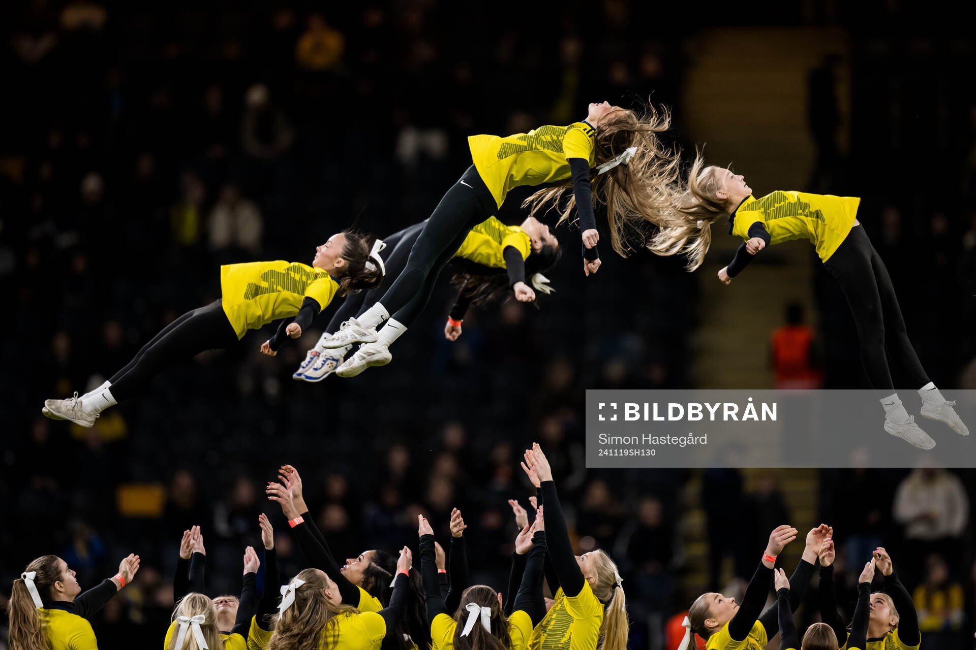 Cheerleaders perform in half-time