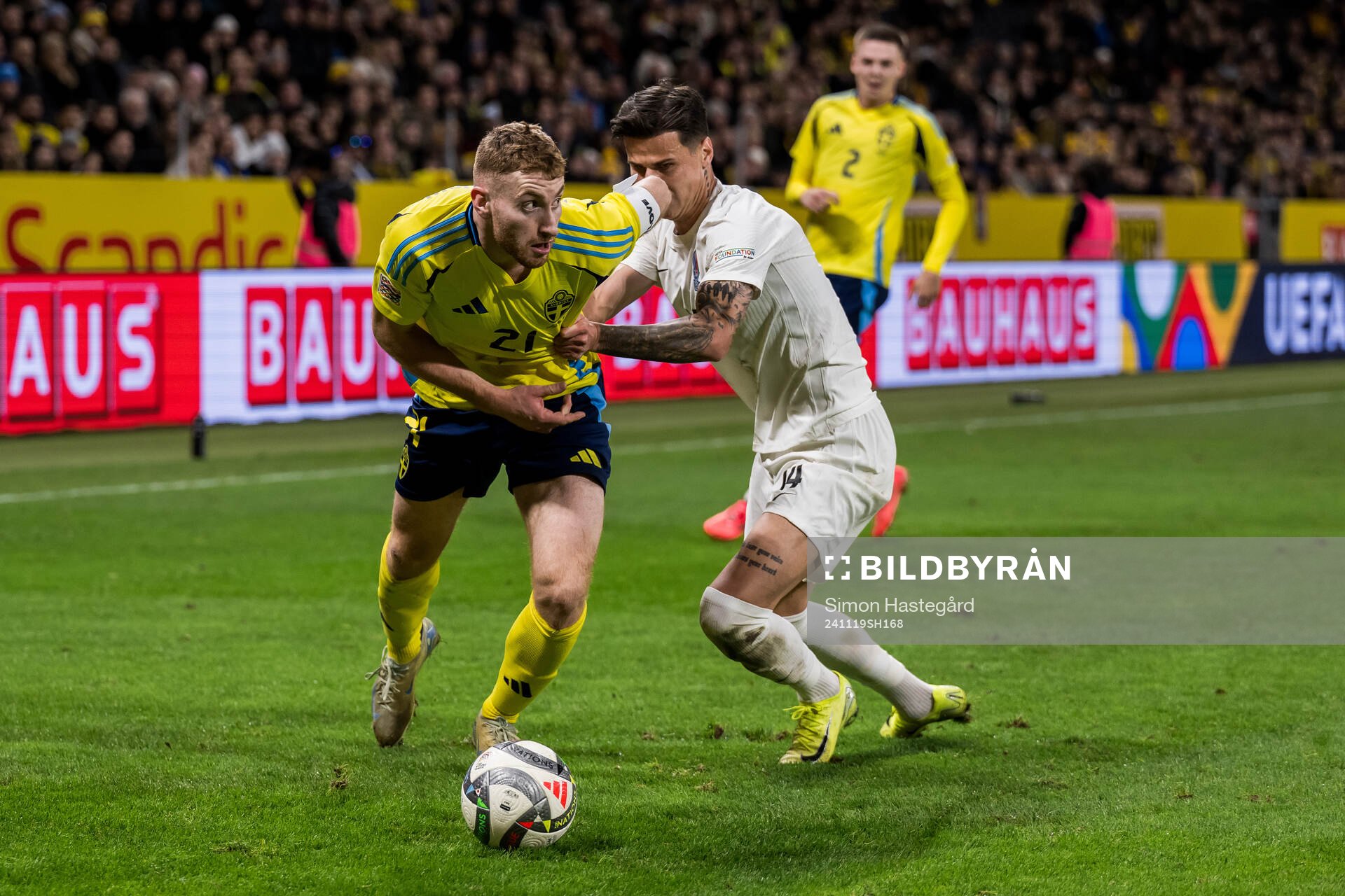 Dejan Kulusevski of Sweden and Mahir Emreli of Azerbaijan