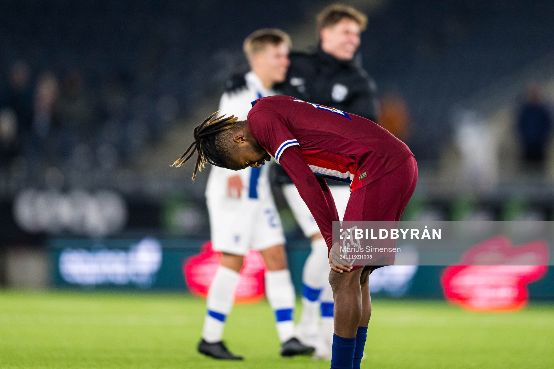 Joel Mugisha of Norway looks dejected