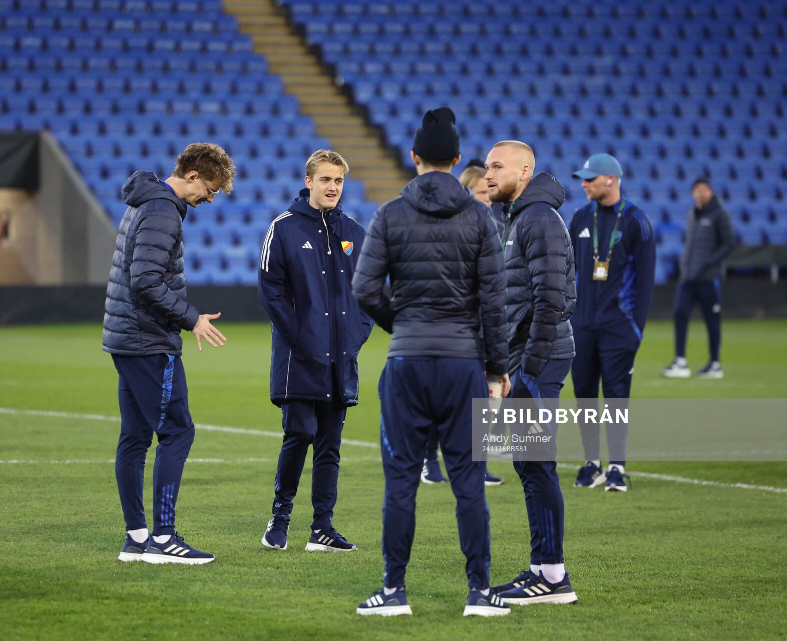 Players of Djurgården inspect the pitch
