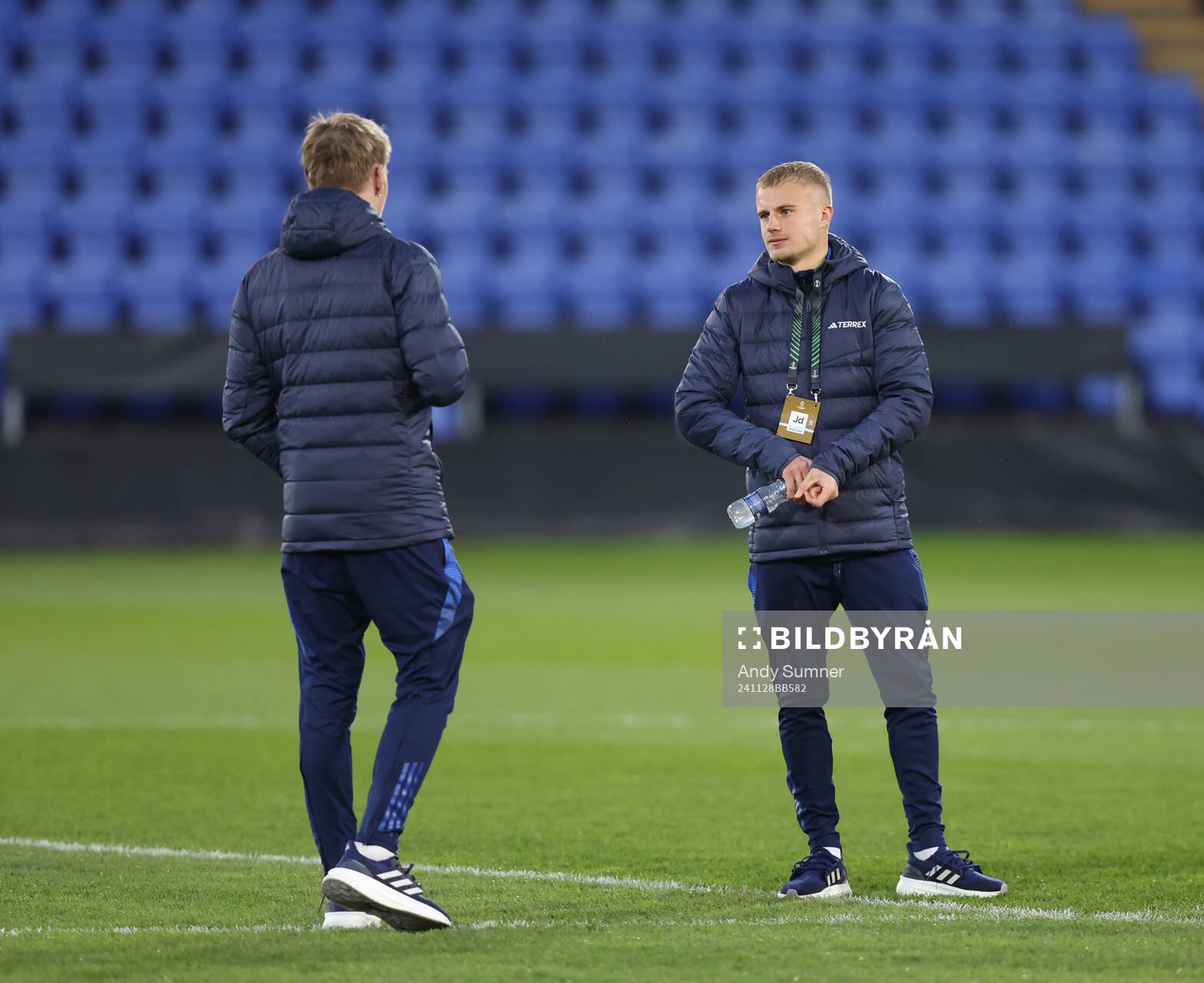 Players of Djurgården inspect the pitch