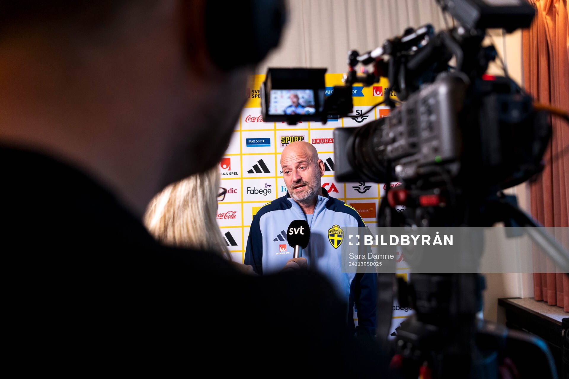 Assistant coach Magnus Wikman of Sweden is interviewed by