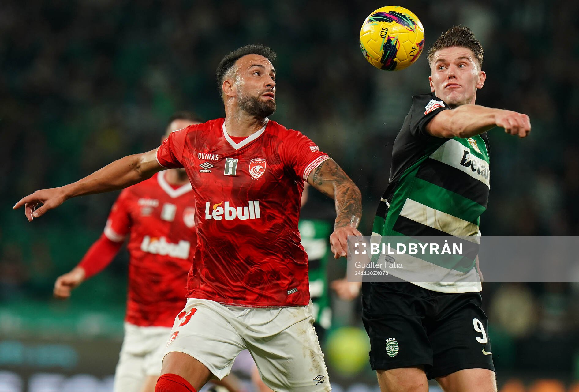 Viktor Gyokeres of Sporting CP with Luis Rocha of CD Santa